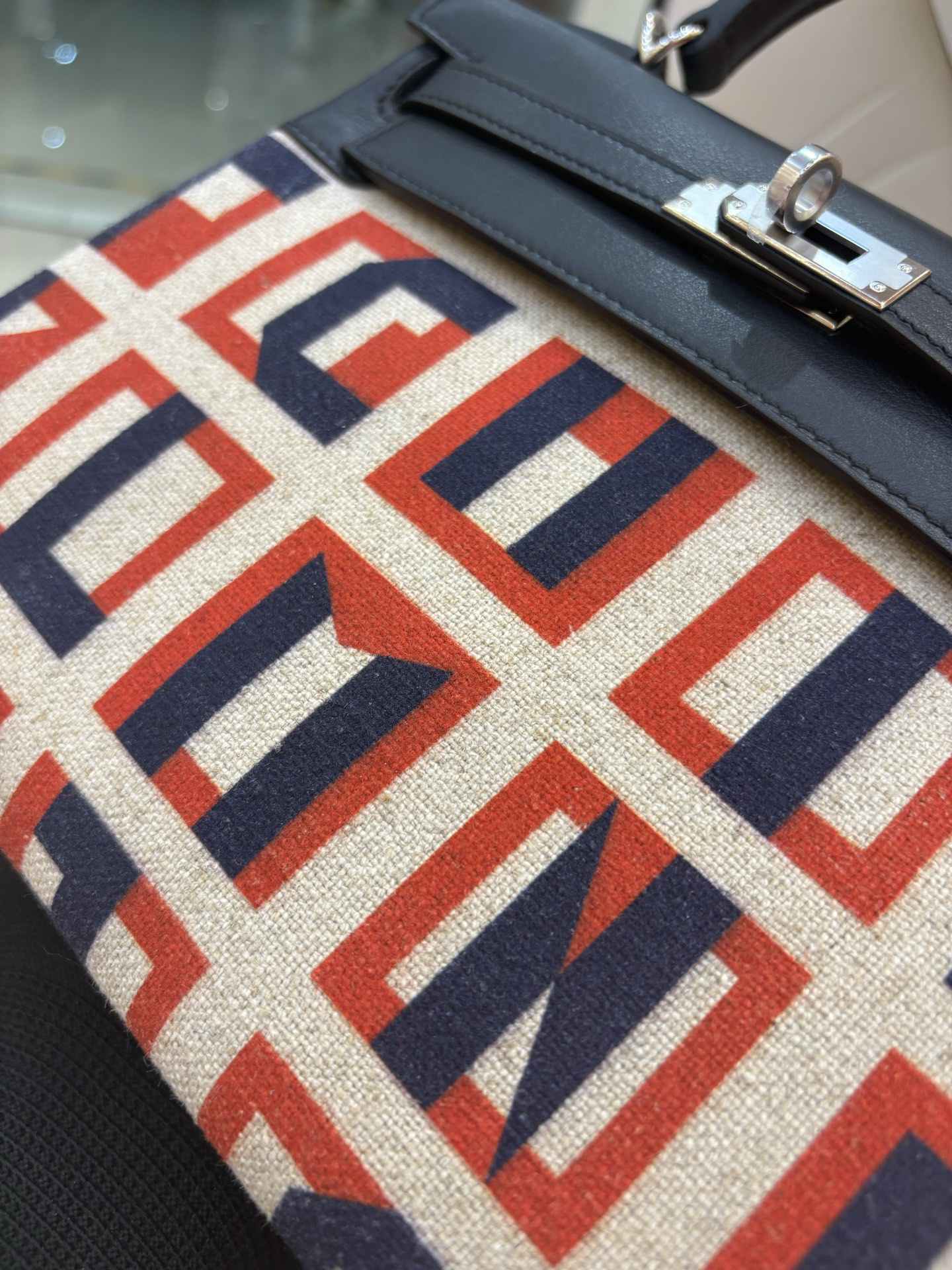 Hermès Kelly 25 Lettered canvas with leather trim in black and silver