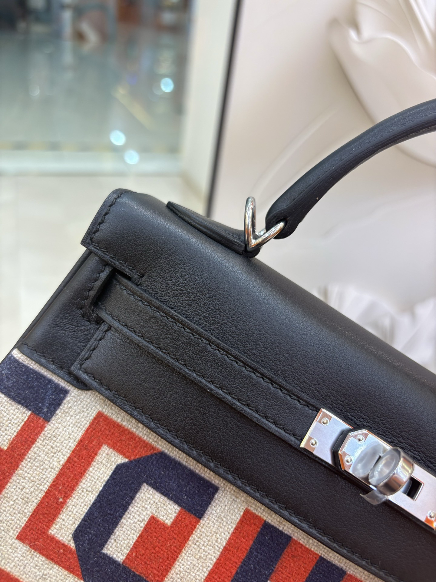 Hermès Kelly 25 Lettered canvas with leather trim in black and silver