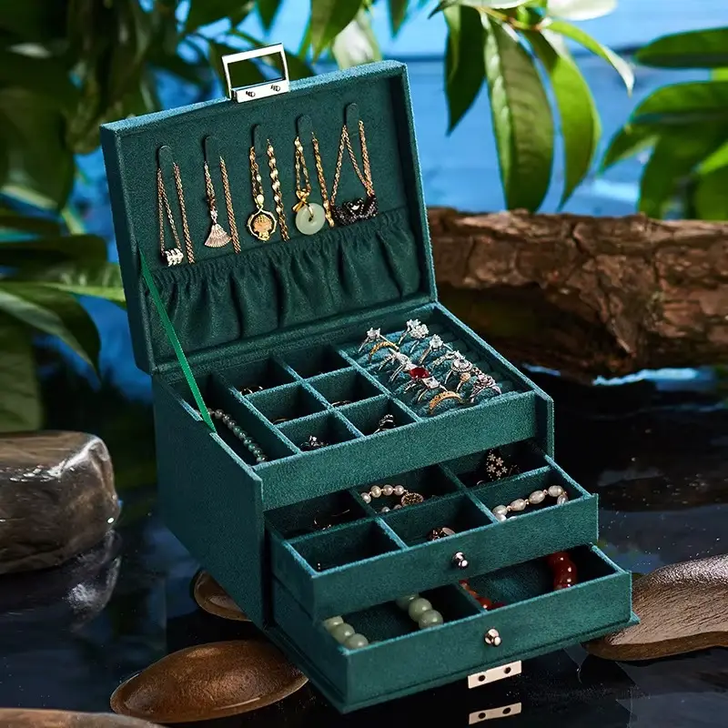 Boîte à bijoux en velours vert
