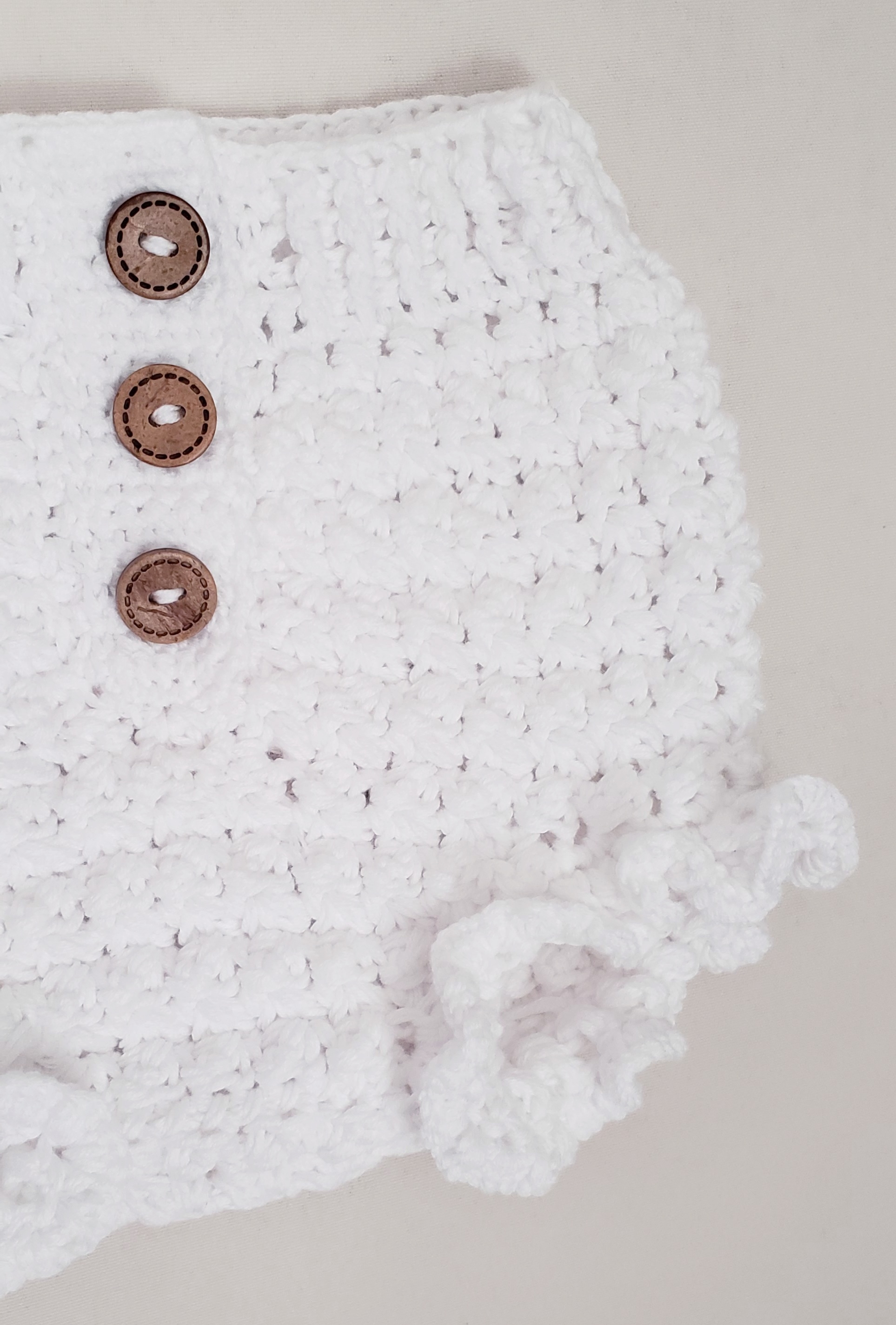 Cubrepañales crochet
