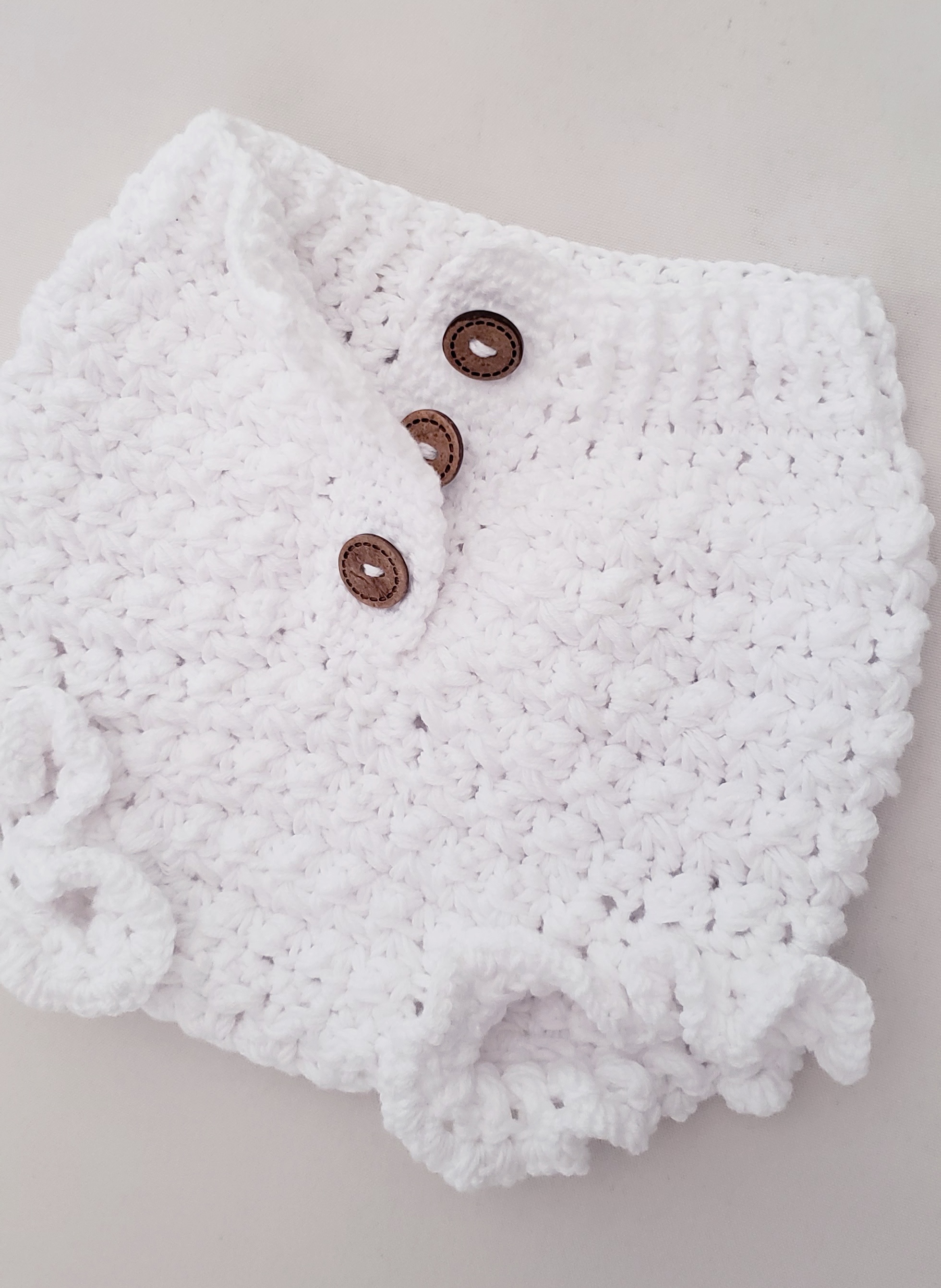 Cubrepañales crochet