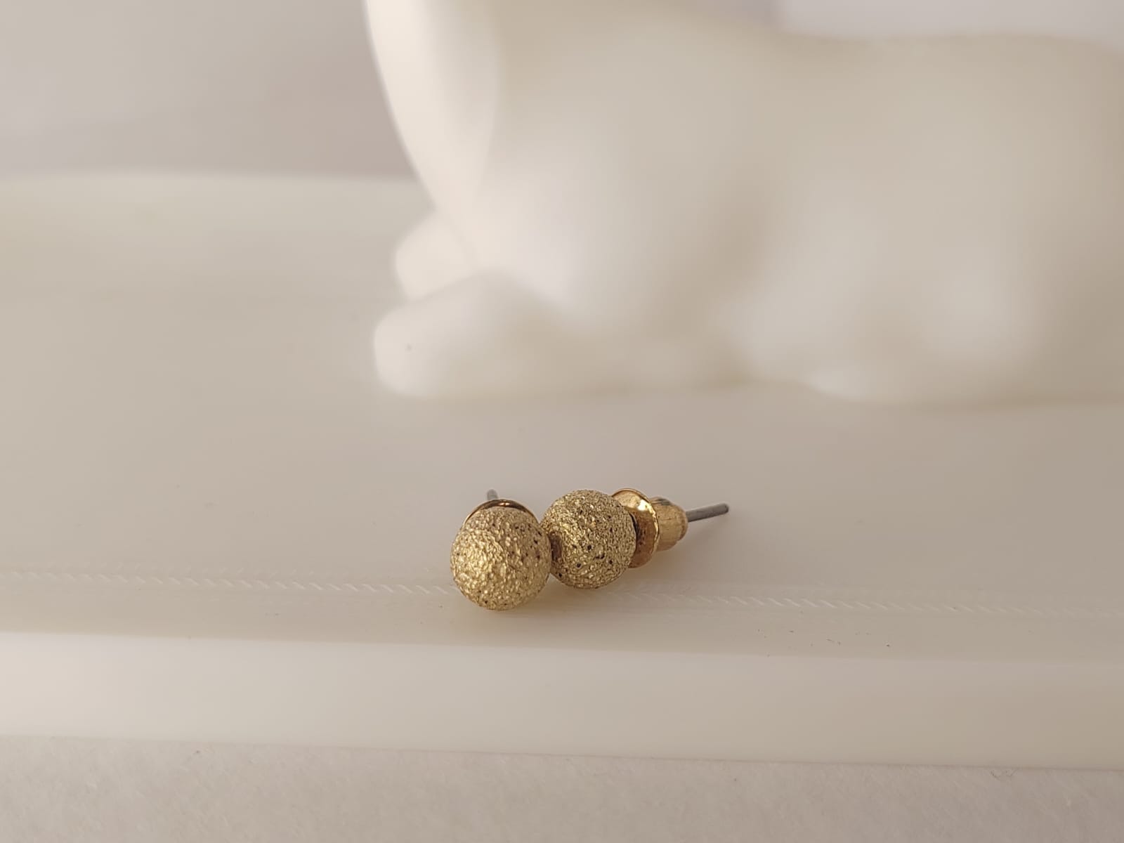 Gold textured stud earrings
