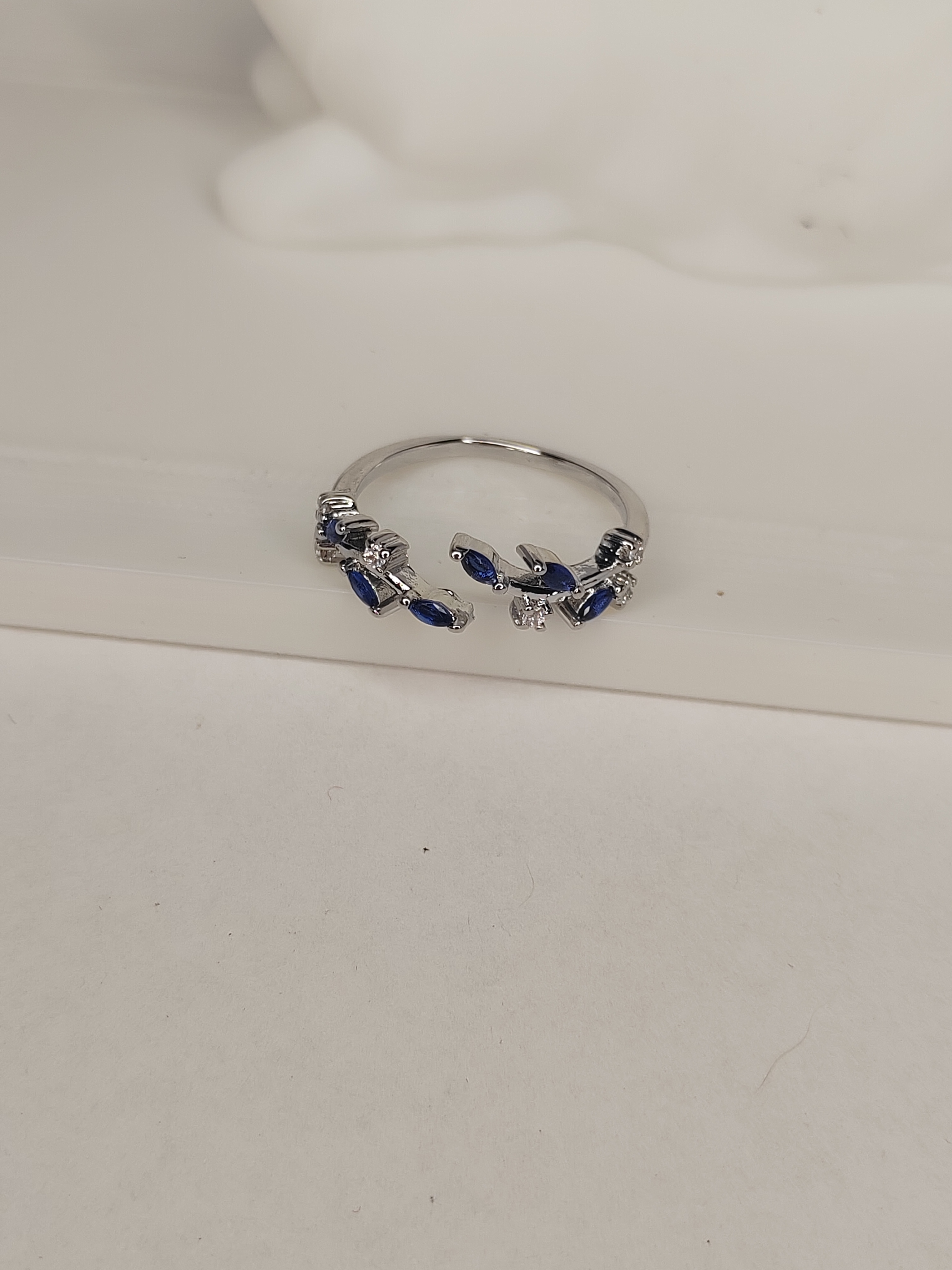 Elegant Silver Adjustable Ring with Blue Stones