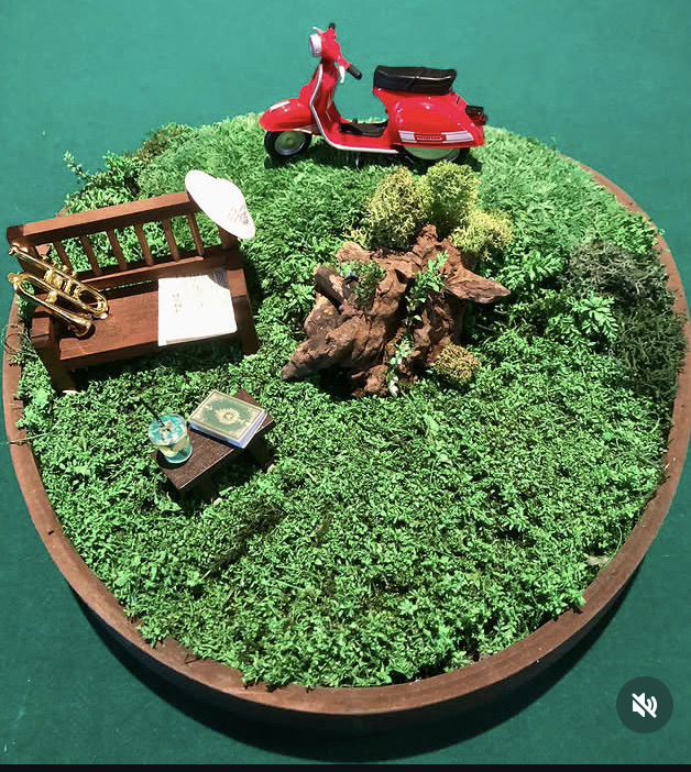 Centrotavola in legno con Vespa fuoricittà