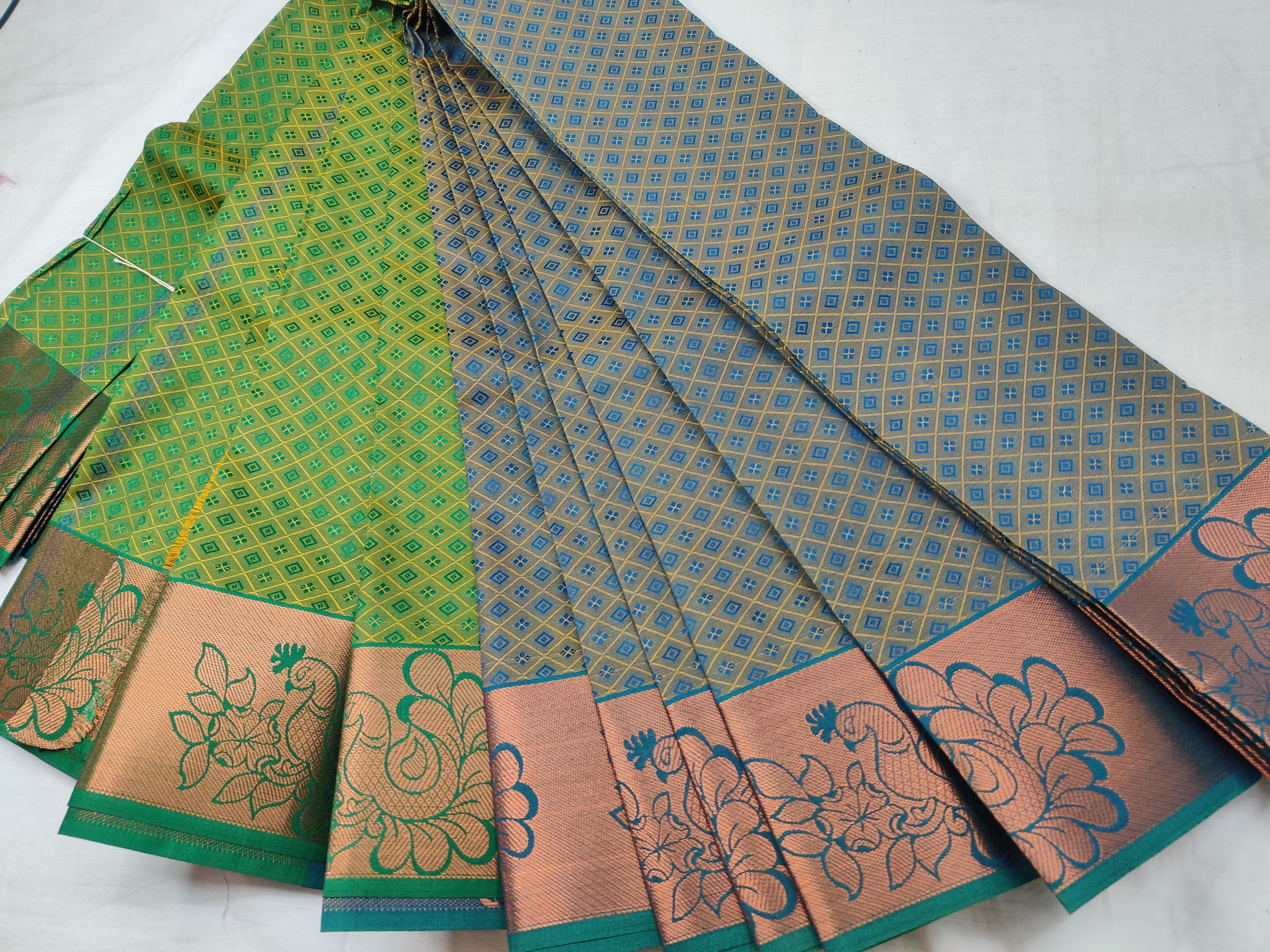 Green & Gold Semi Soft Silk Saree with Peacock Zari Border