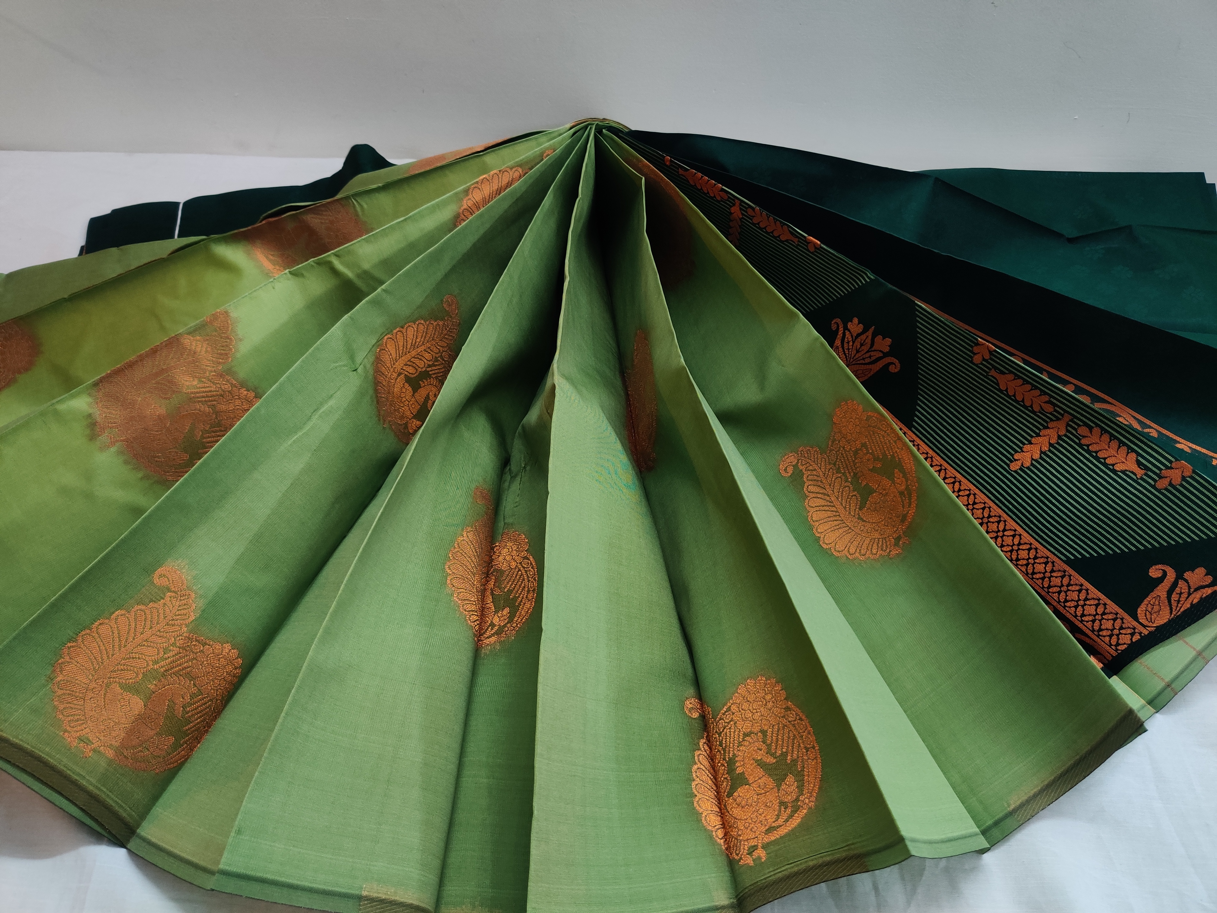 Pastel Green Semi Soft Silk Saree with Dark Emerald Jacquard Blouse