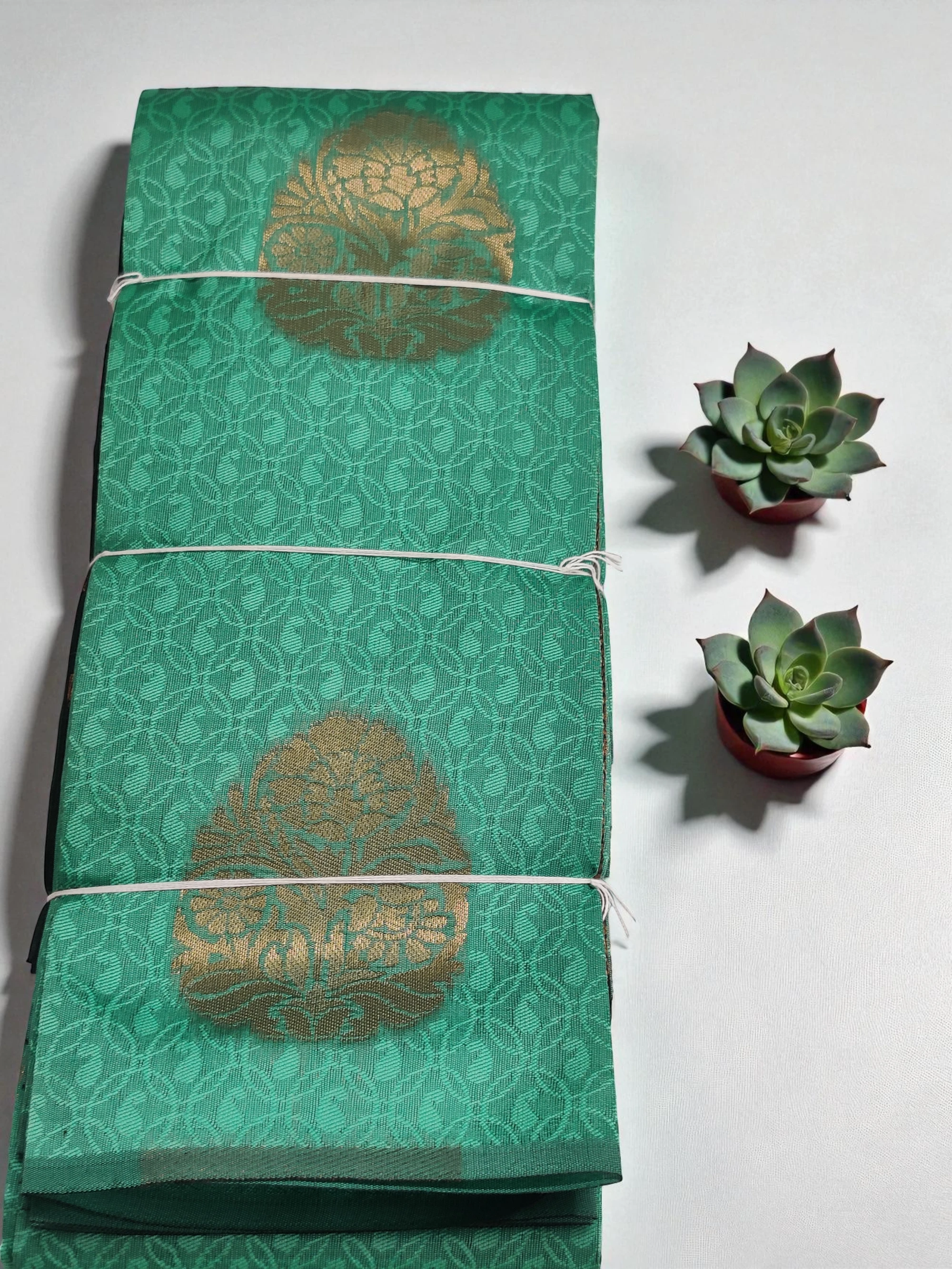 Emerald Green Semi Soft Silk Saree with Zari Motif Work