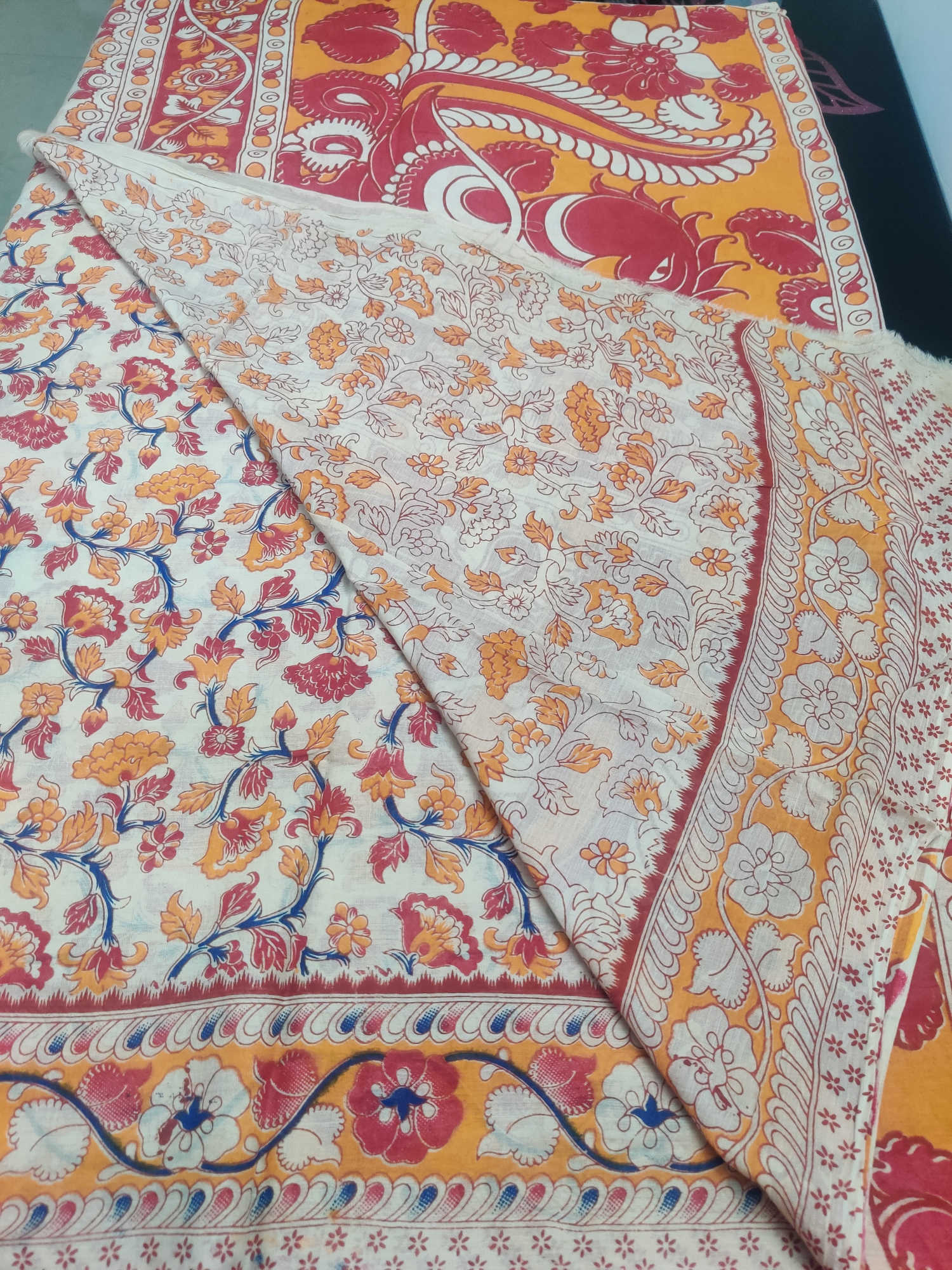 Kalamkari Cotton Saree – Cream Base with Red & Mustard Floral Body & Traditional Kalamkari Pallu