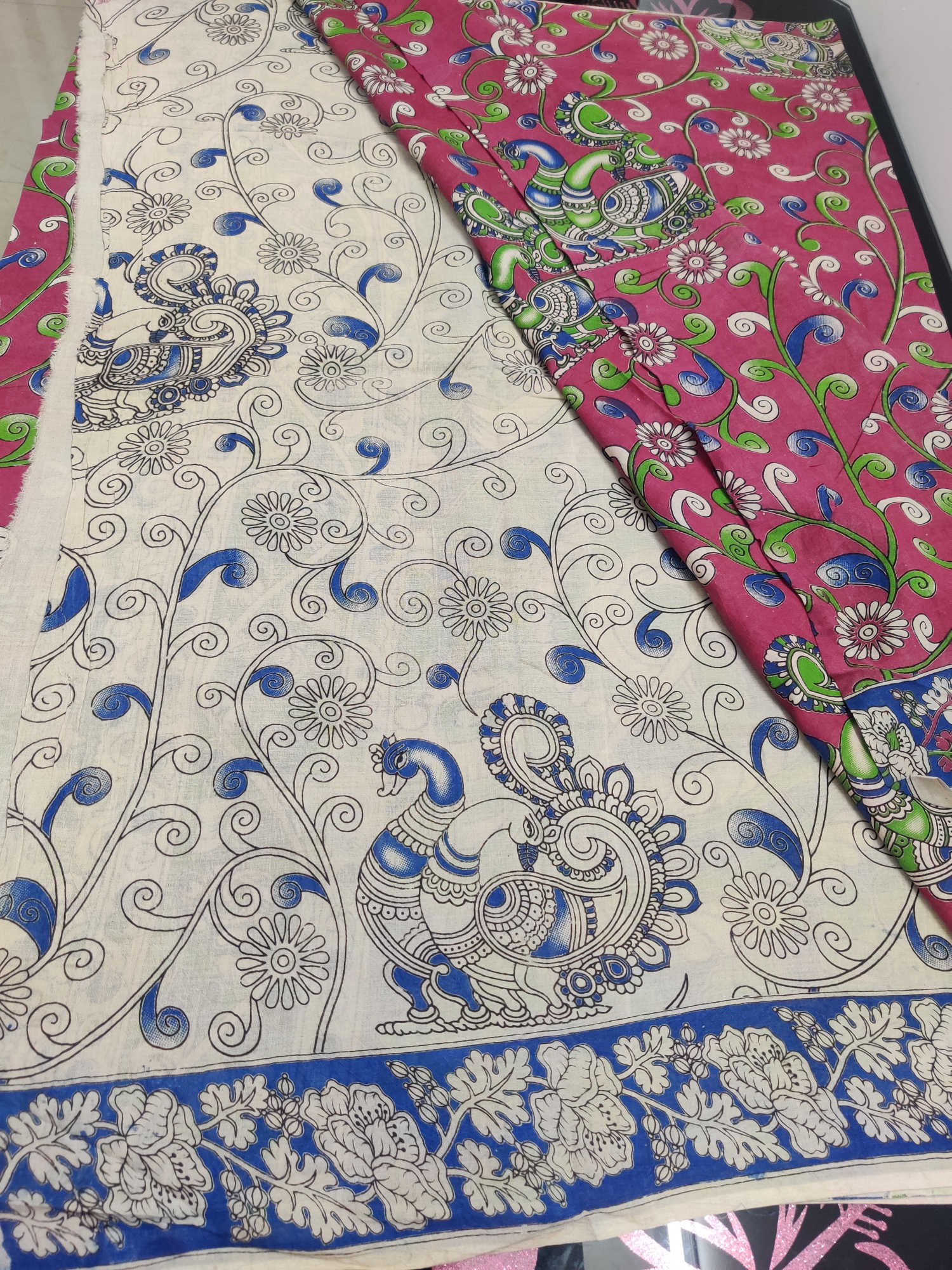 Kalamkari Cotton Saree – Pink Body with Blue–Green Peacock Motifs & Floral Vines | Contrast Blue Kalamkari Blouse