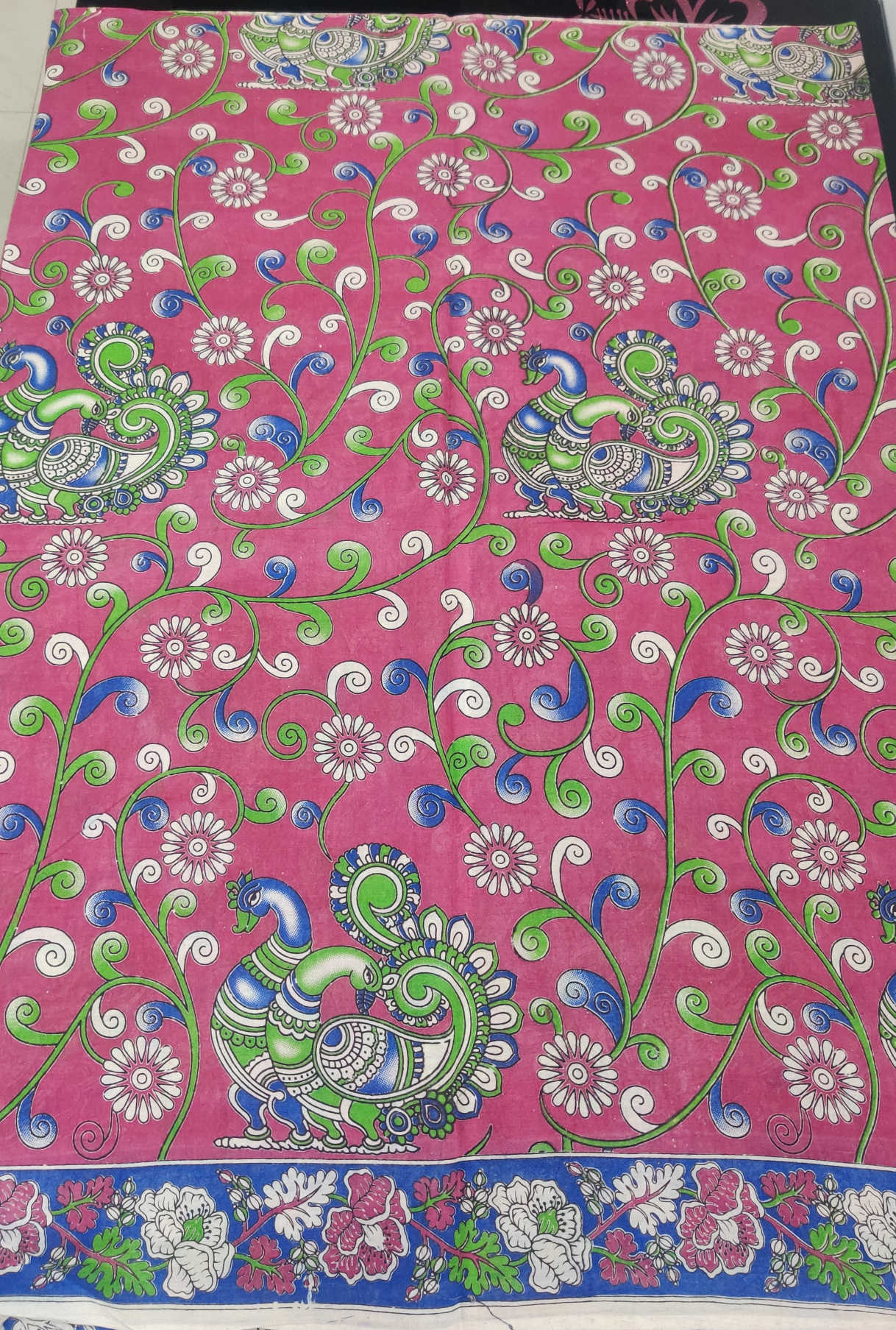 Kalamkari Cotton Saree – Pink Body with Blue–Green Peacock Motifs & Floral Vines | Contrast Blue Kalamkari Blouse