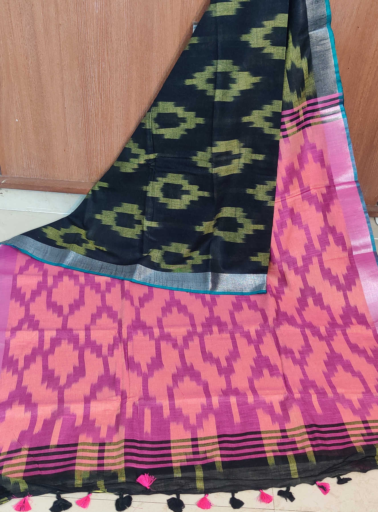 Linen Cotton Saree – Black Ikkat Body with Peach–Pink Ikkat Pallu & Teal Contrast Border