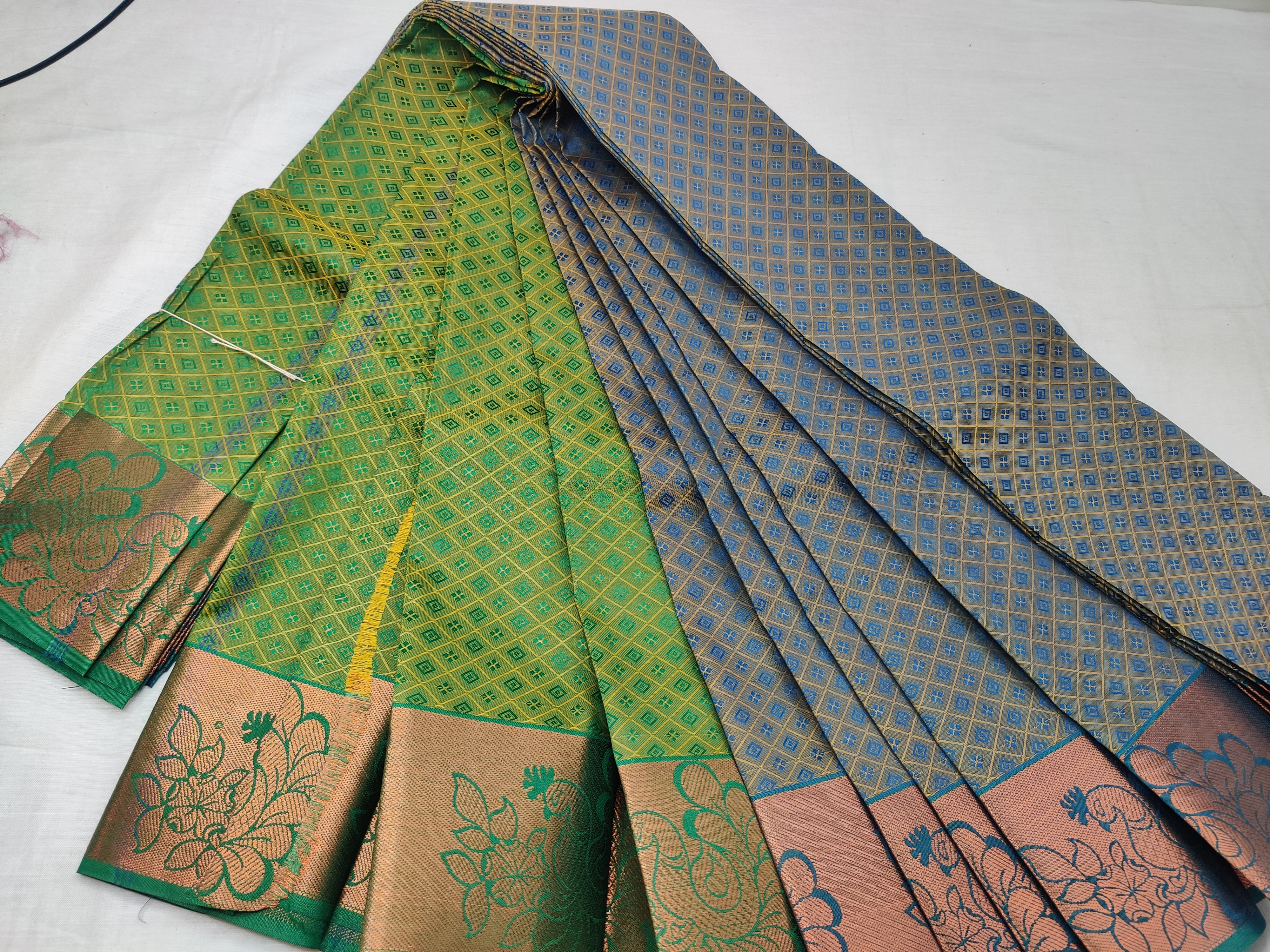 Green & Gold Semi Soft Silk Saree with Peacock Zari Border