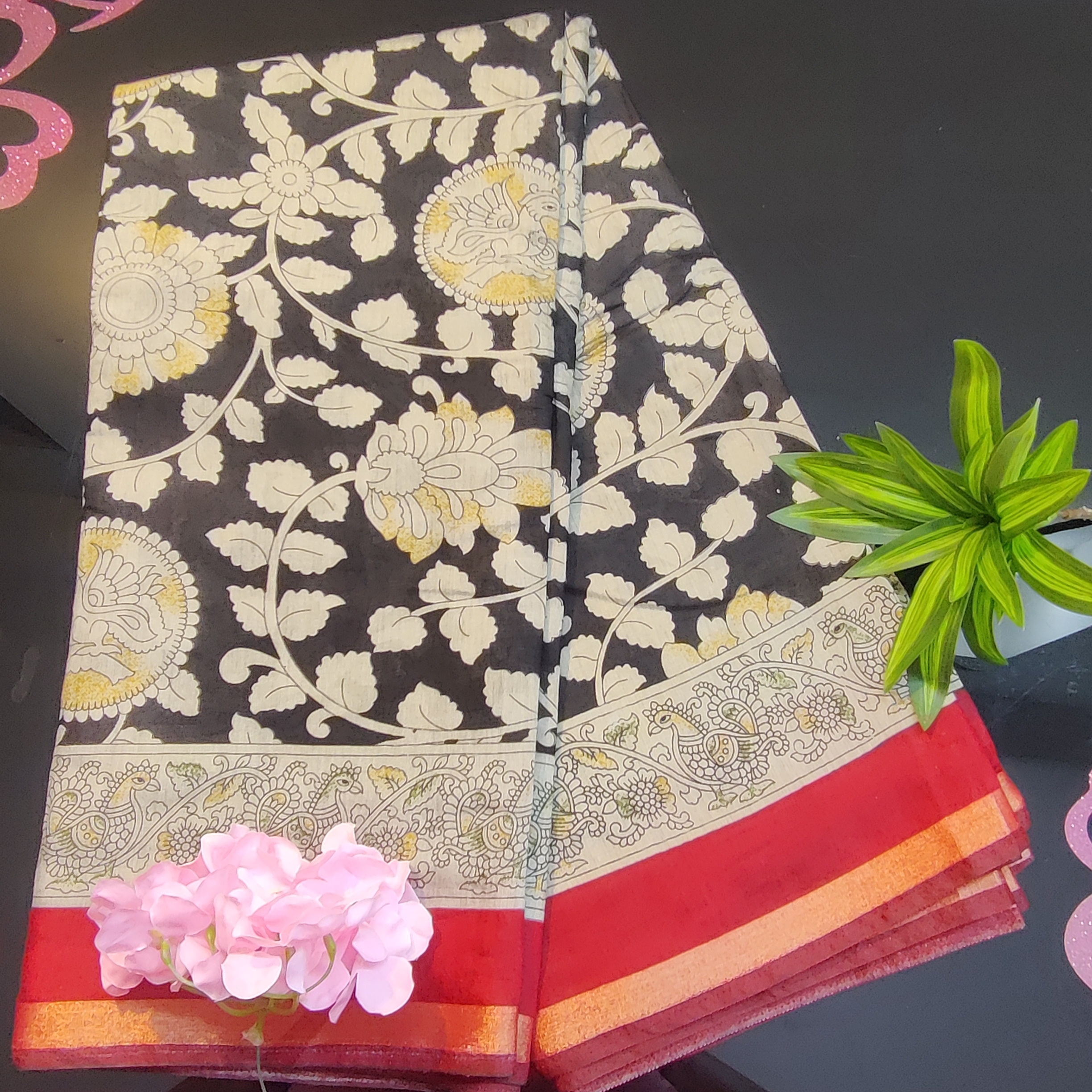 Kalamkari Muslin Silk Saree – Vibrant Green Base with Pink–Orange Floral Body & Traditional Kalamkari Peacock Border