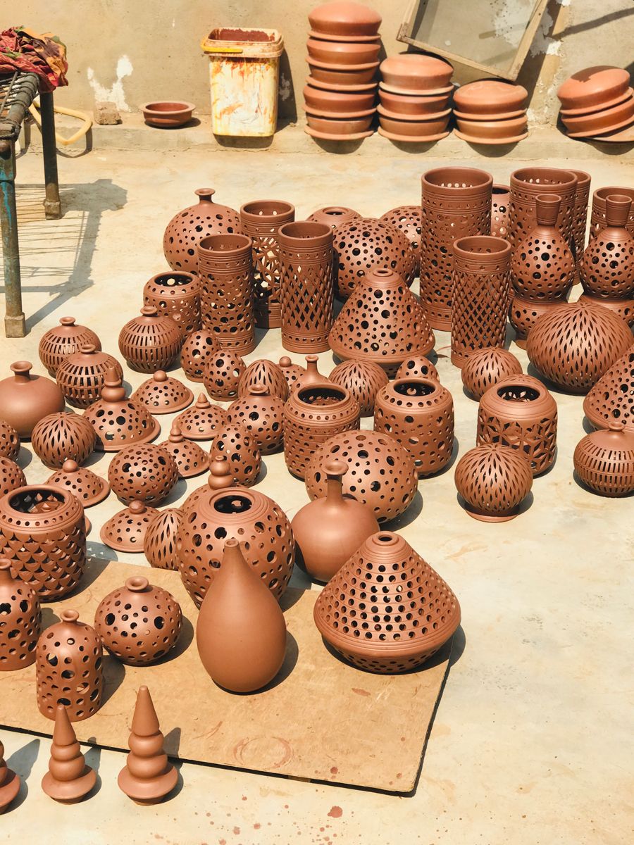 Terracotta planters and diyas