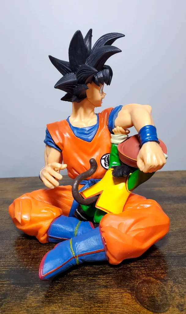 Anime Action Figure – Son Goku Holding His Son | Collectible Dragon Warrior Figurine