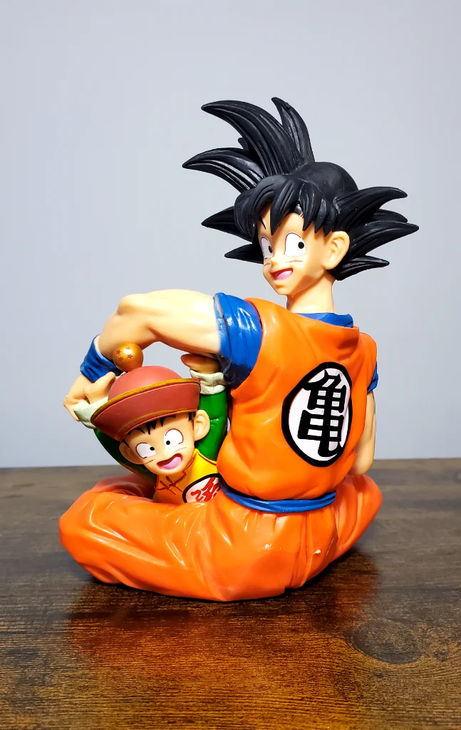 Anime Action Figure – Son Goku Holding His Son | Collectible Dragon Warrior Figurine