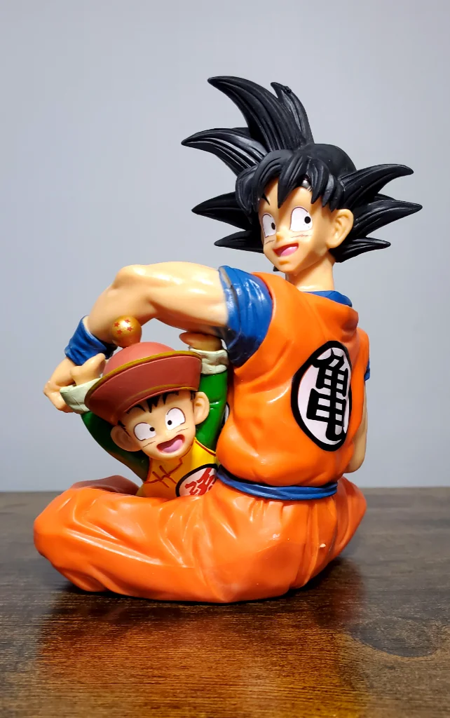 Anime Action Figure – Son Goku Holding His Son | Collectible Dragon Warrior Figurine