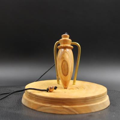 Pendule en bois d'olivier B83