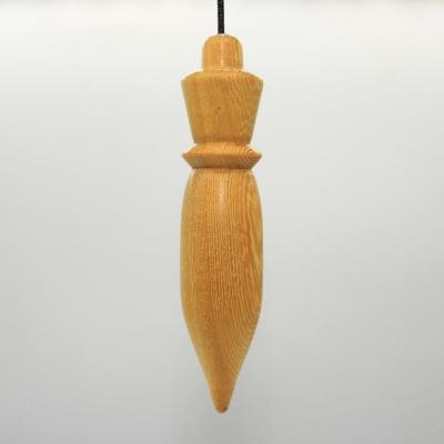 Pendule égyptien en bois de Difou C13