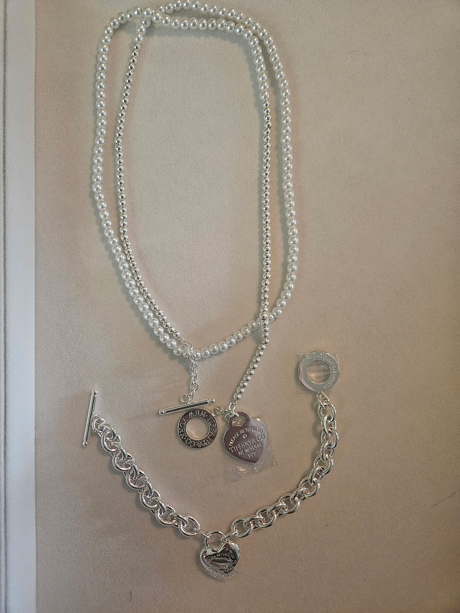 Pearl necklace and silver charm bracelet set