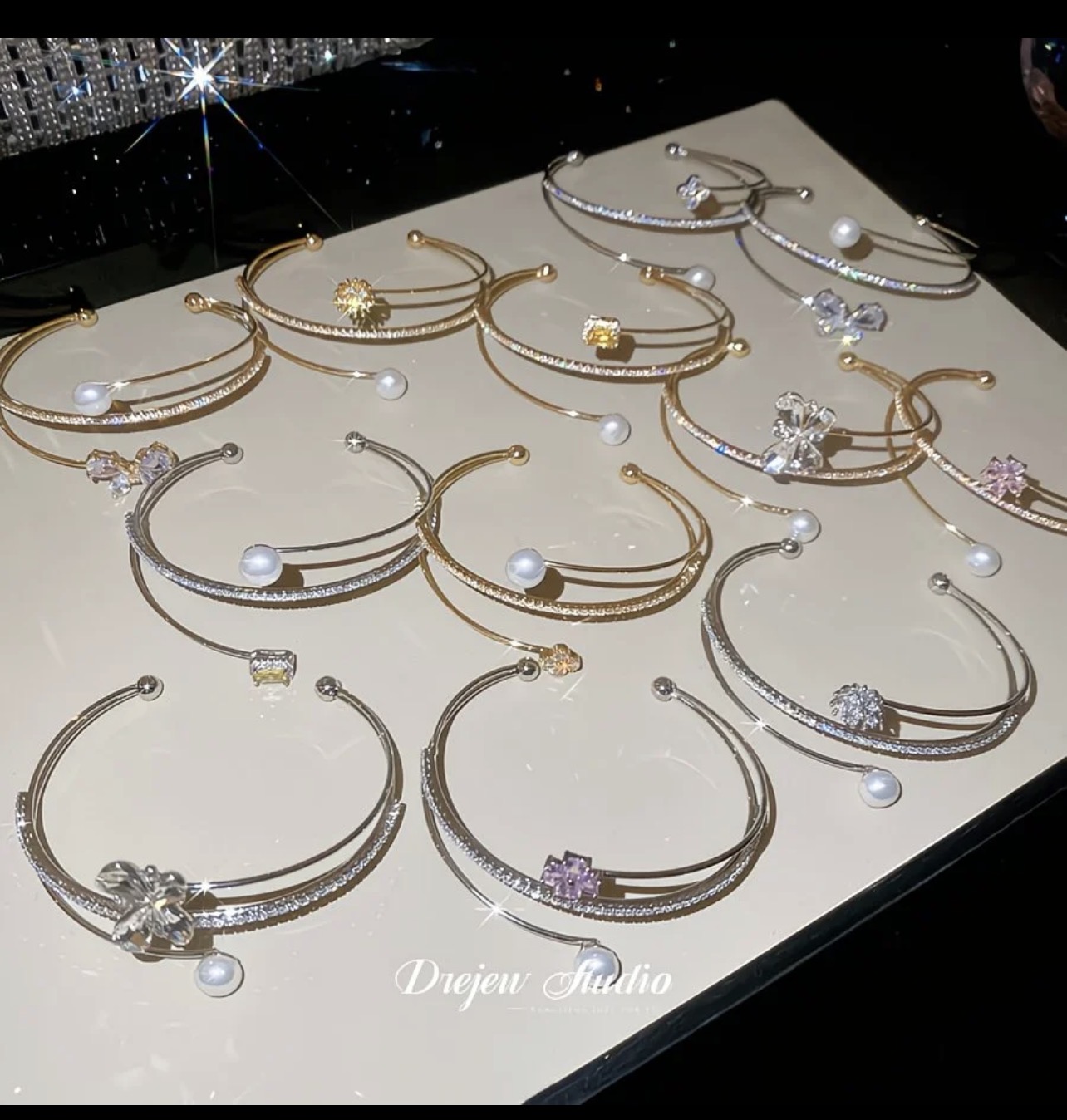 Bracelet en or avec perle et papillon