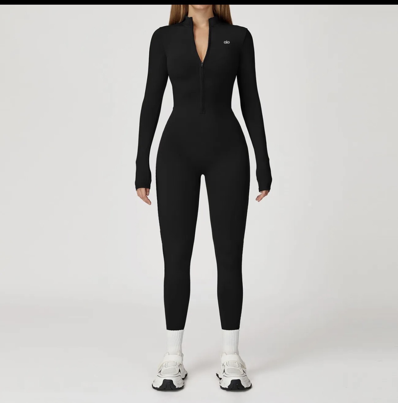 Combinaison moulante violette