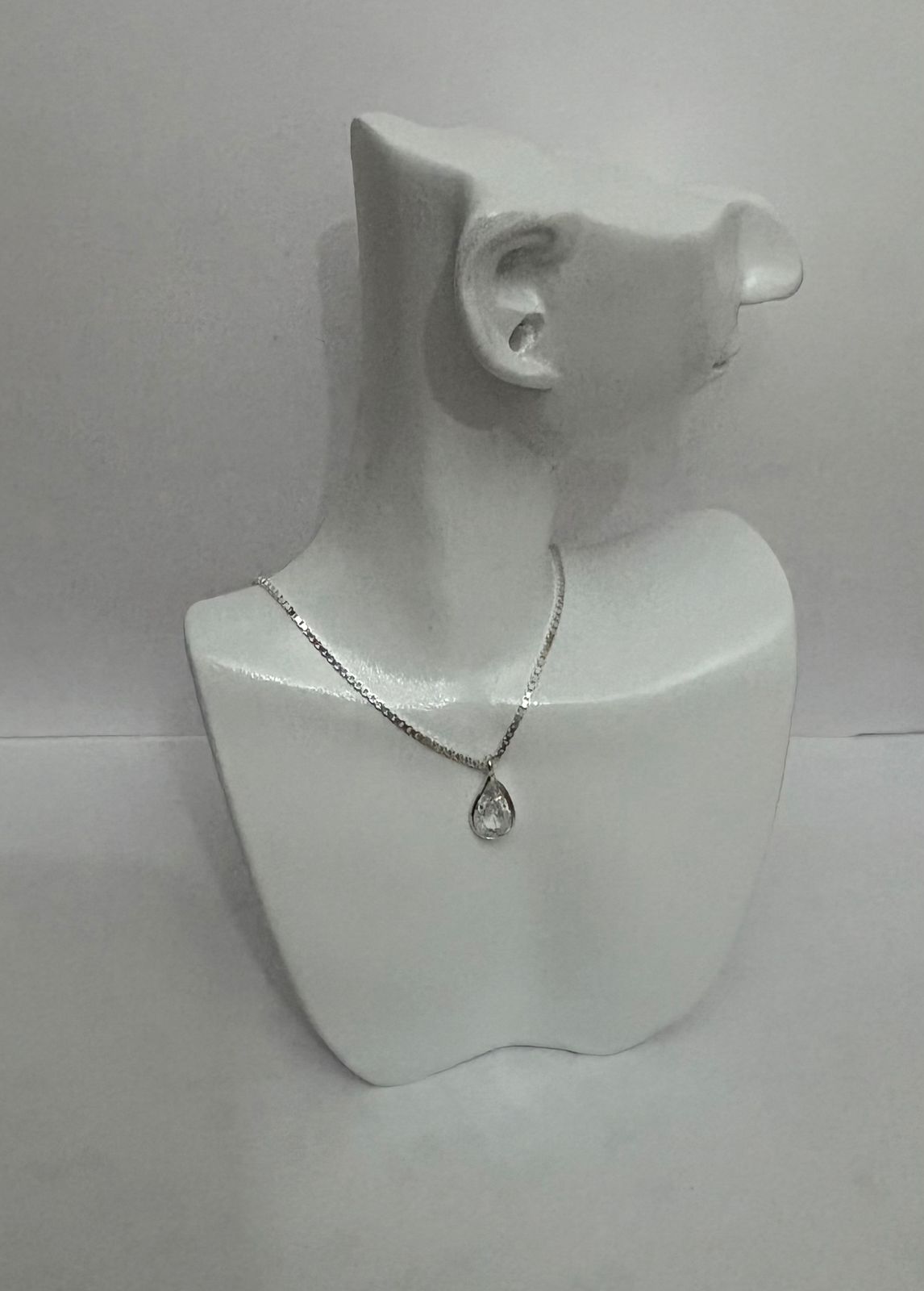 Colar de prata com pingente ponto de luz