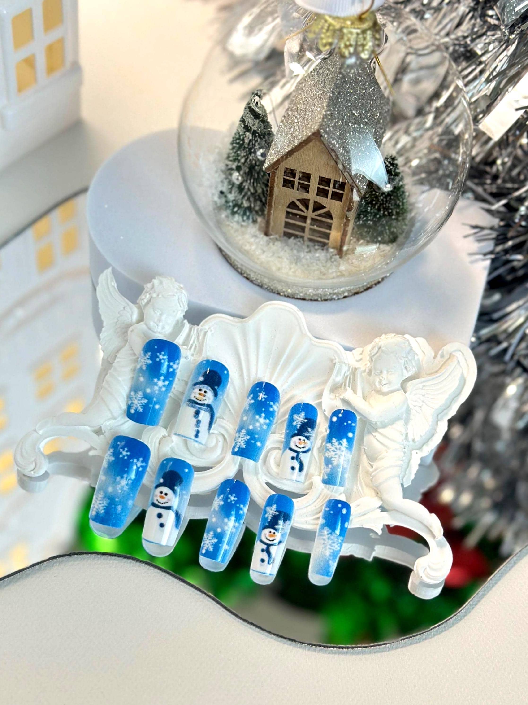 Frosty the Snowman and Snowflakes Falling on Blue Background - Festive Season Acrylic Press-On Nails