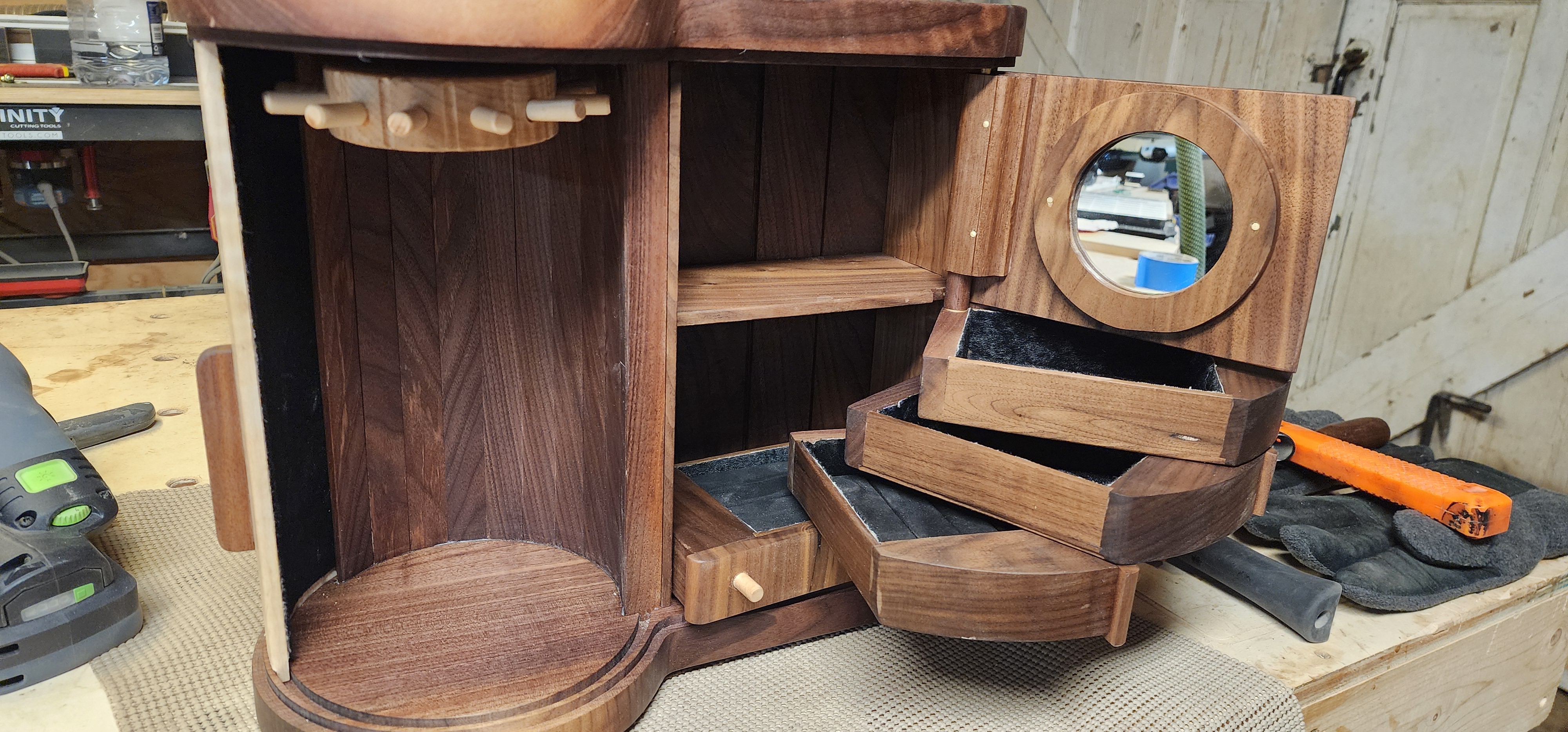 Walnut and maple jewlery box with tambour door, necklace ring and drawers 