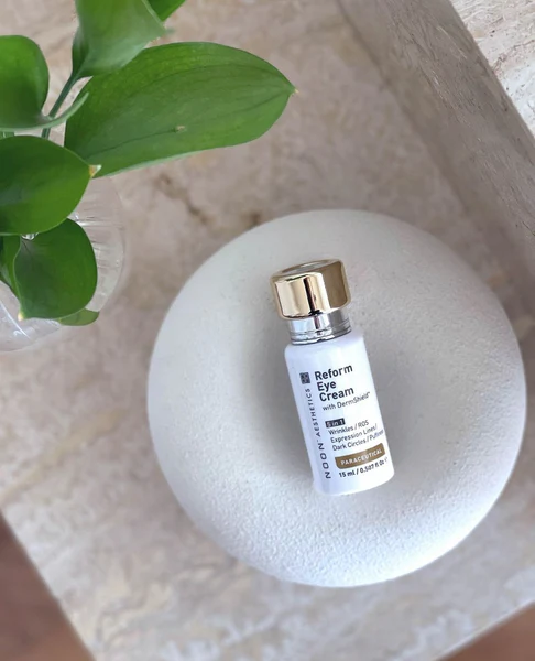 NOON Reform Eye Cream, Stangrinamasis ir skaistinantis paakių kremas 15 ml