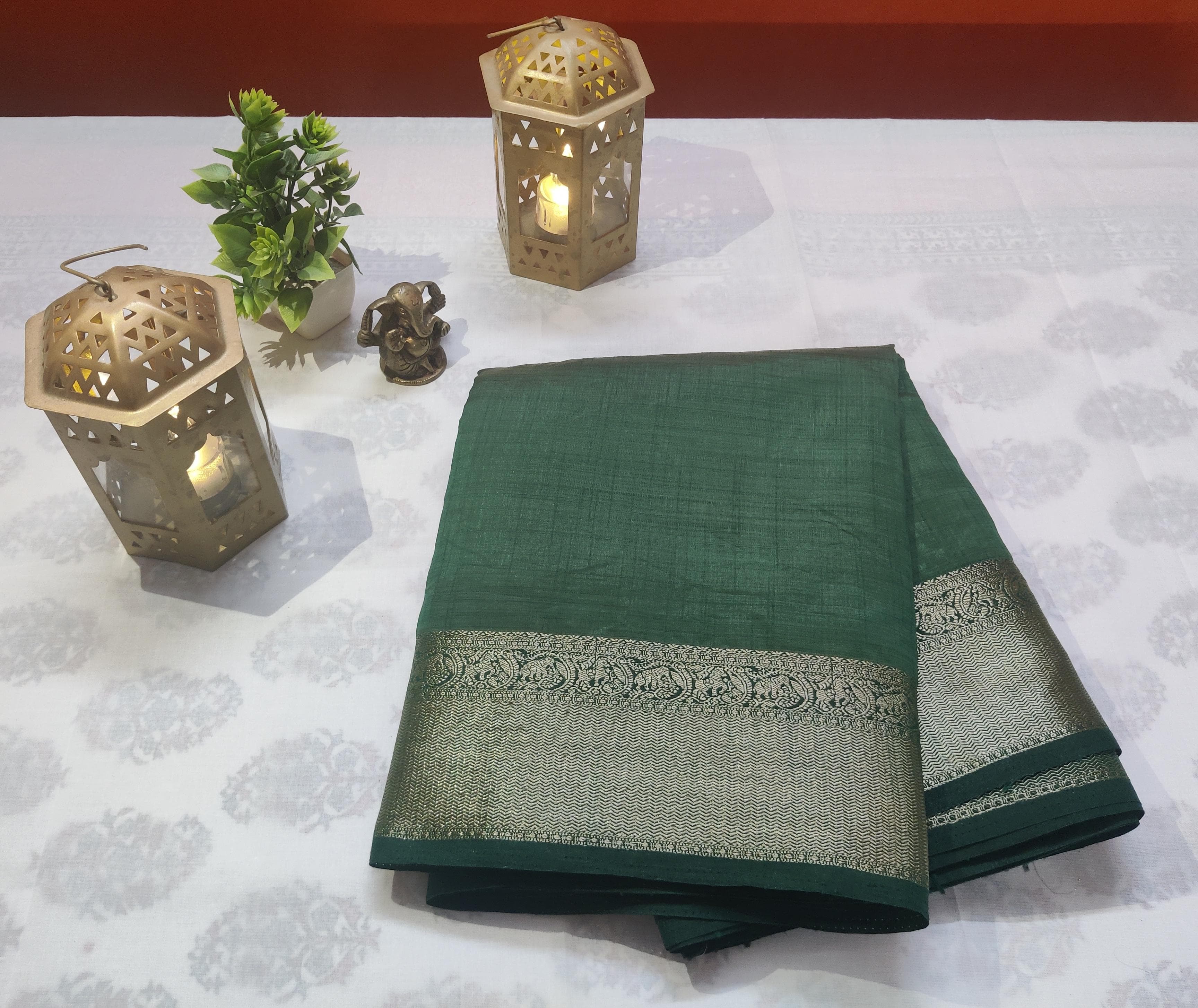 Forest Green Tussar Saree With Rich Golden Design Border