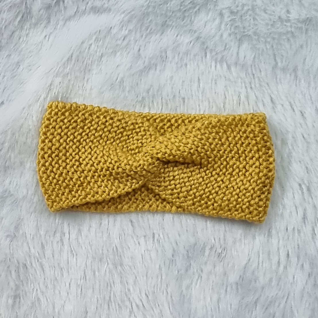 Knitted yellow headband