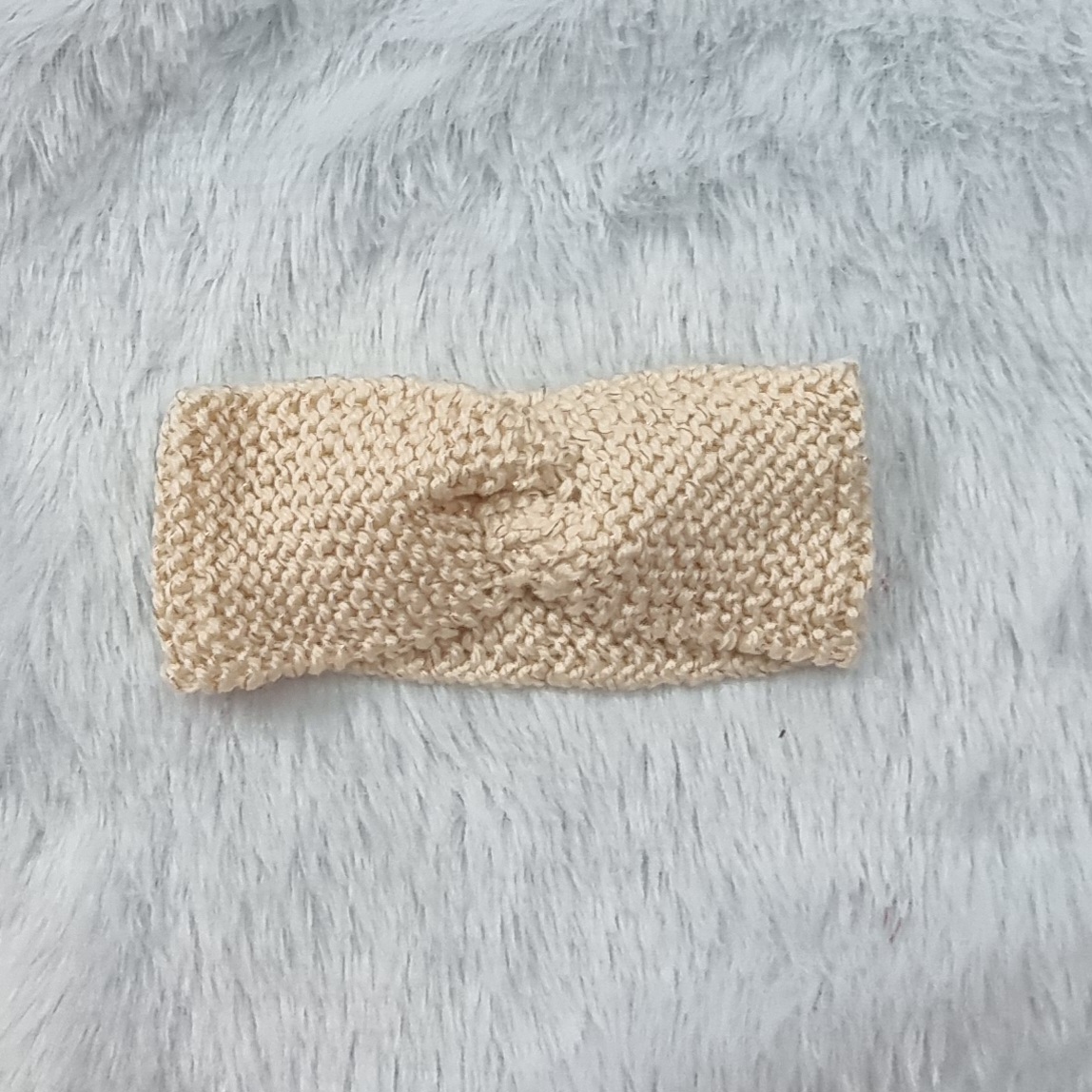 Knitted beige headband