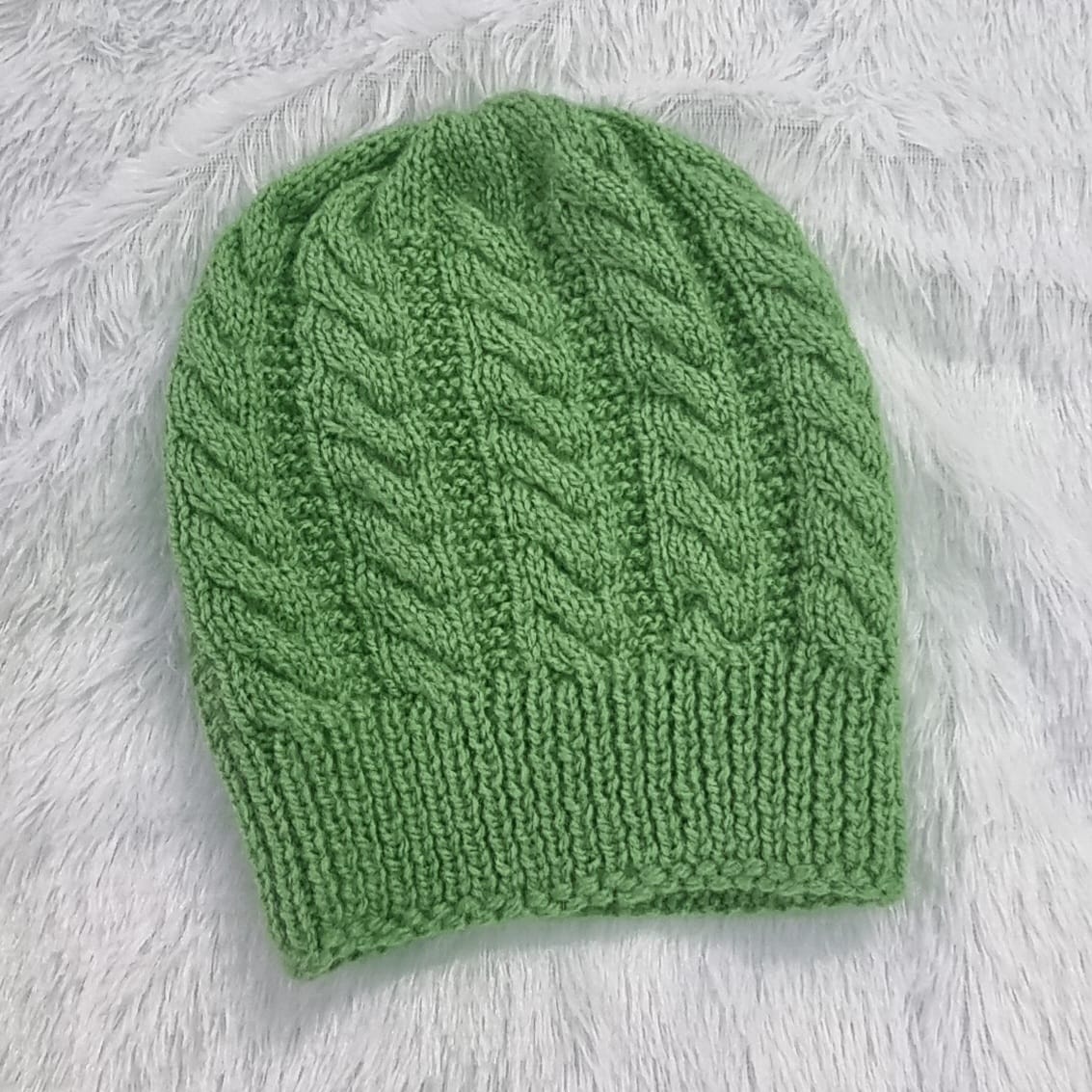 Hand-knitted green beanie