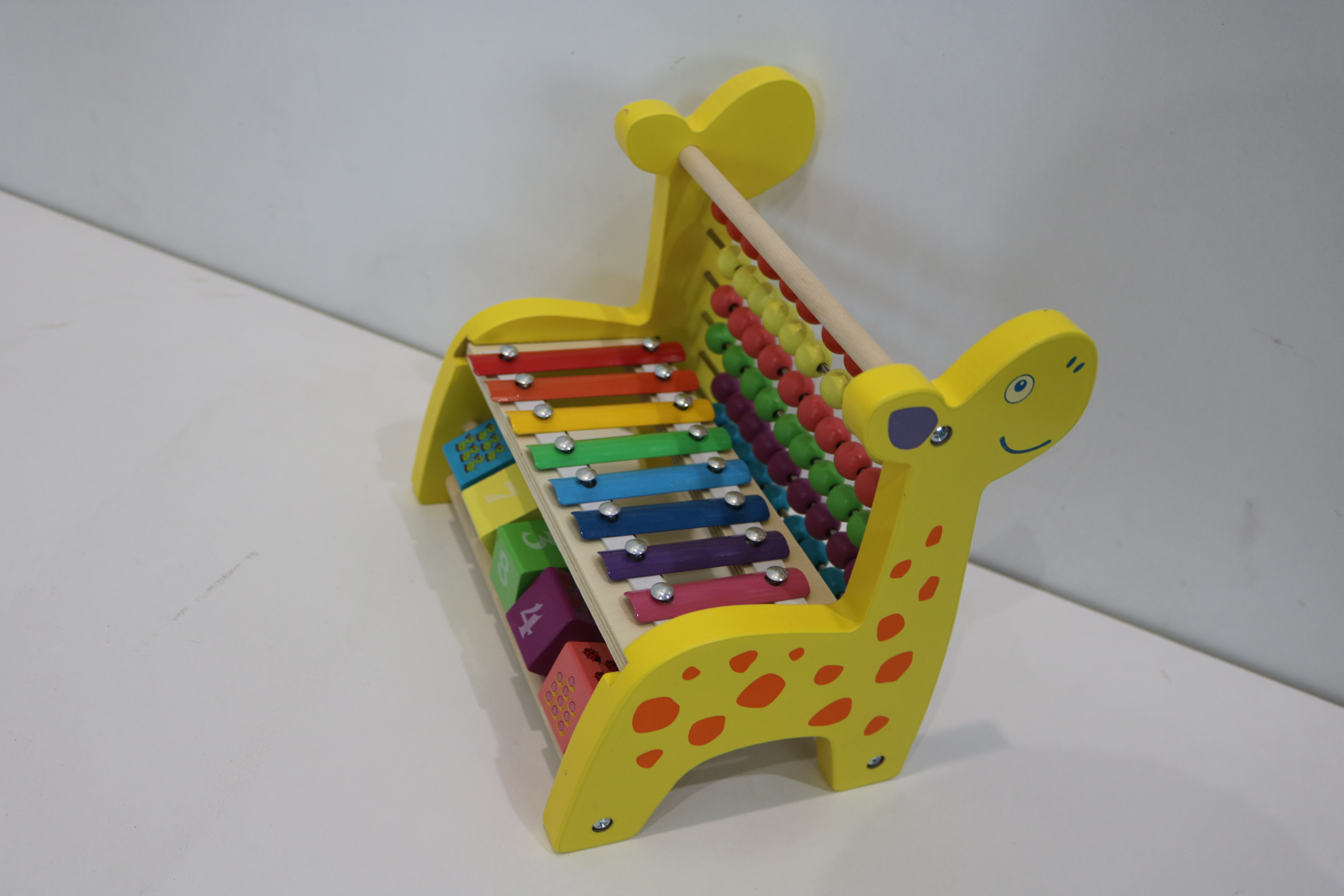 Children’s giraffe xylophone and abacus toy