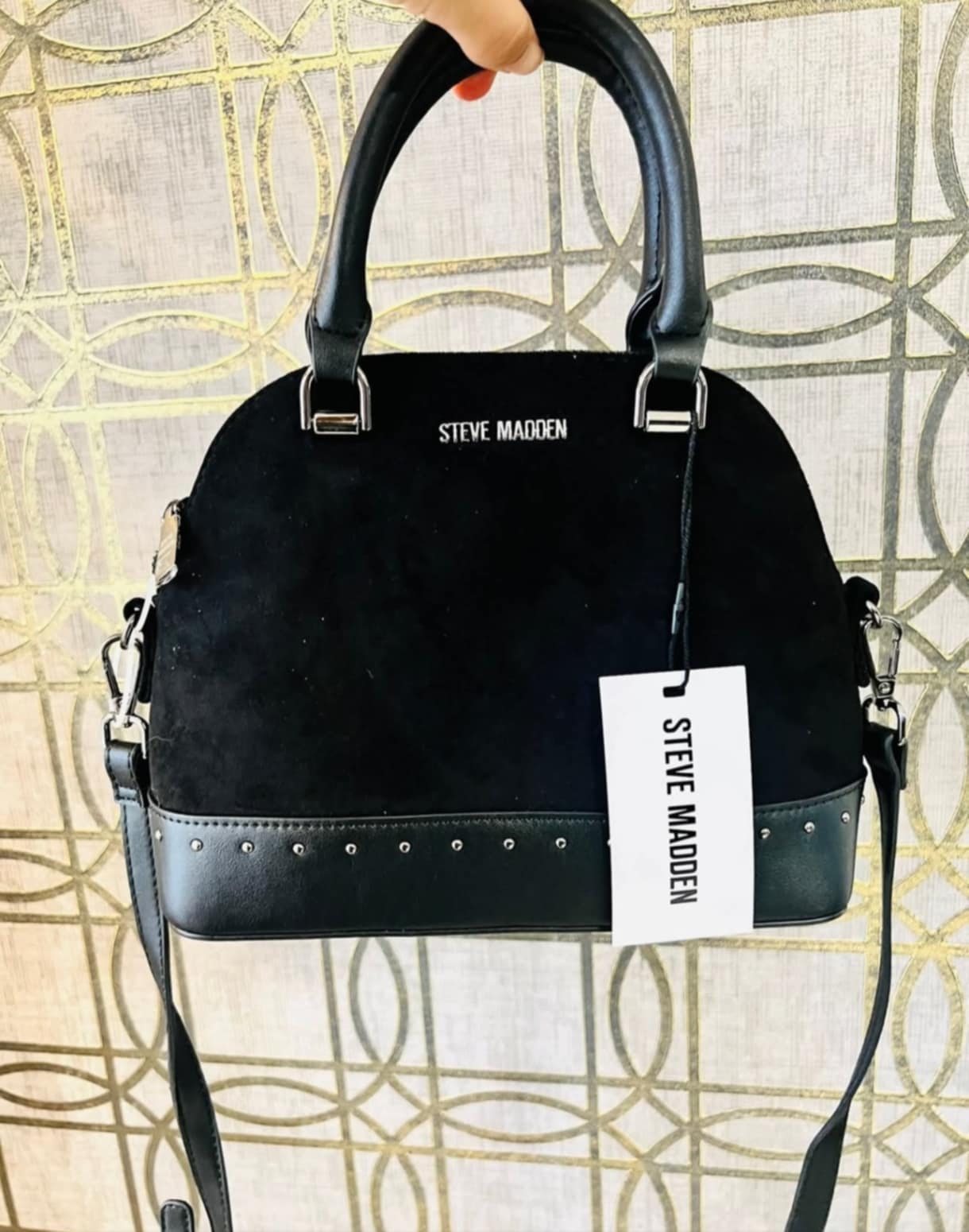 Bolso negro Steve Madden.