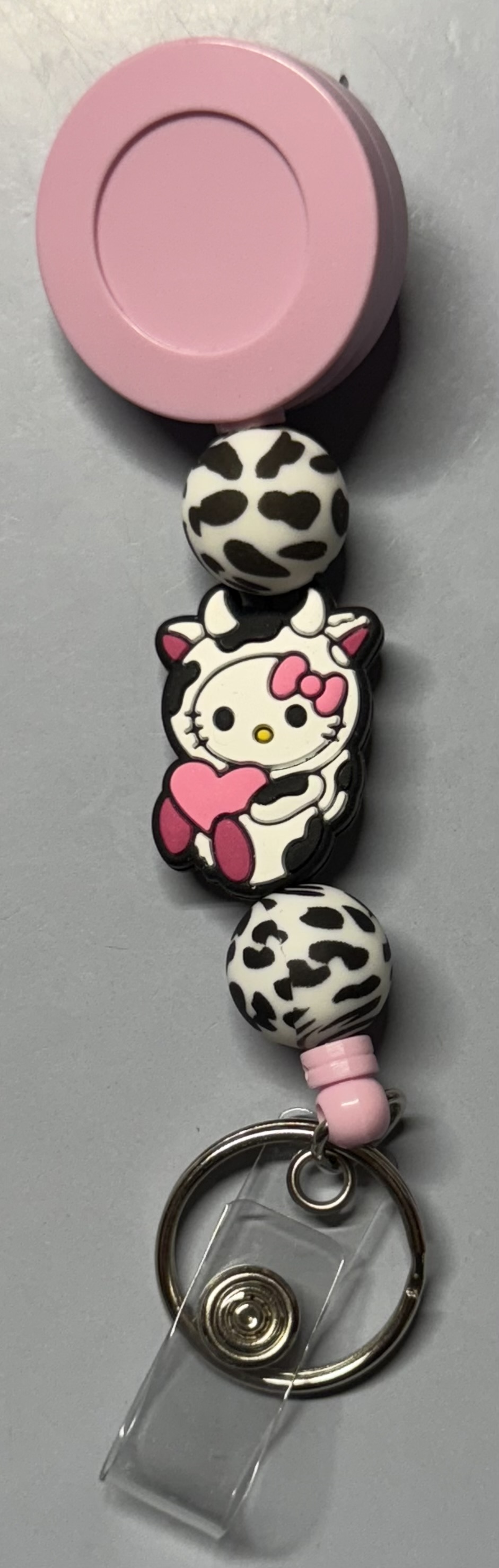 H. Kitty dressed as a Cow Badge Reel