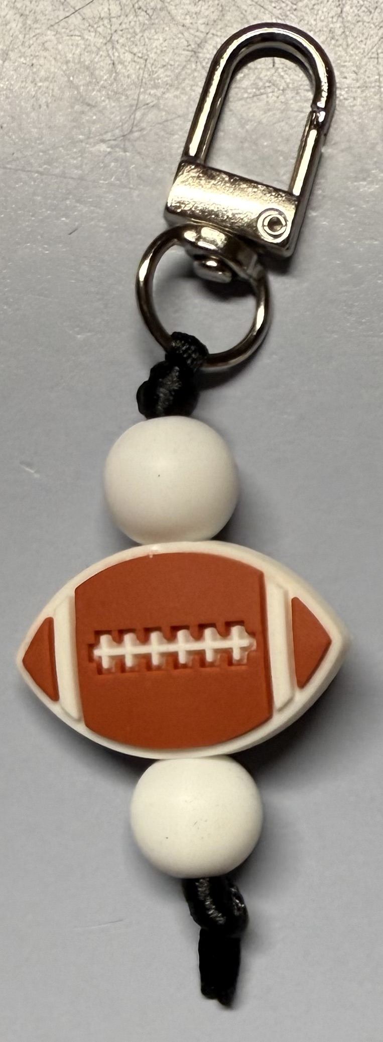 Football Zipper Pull