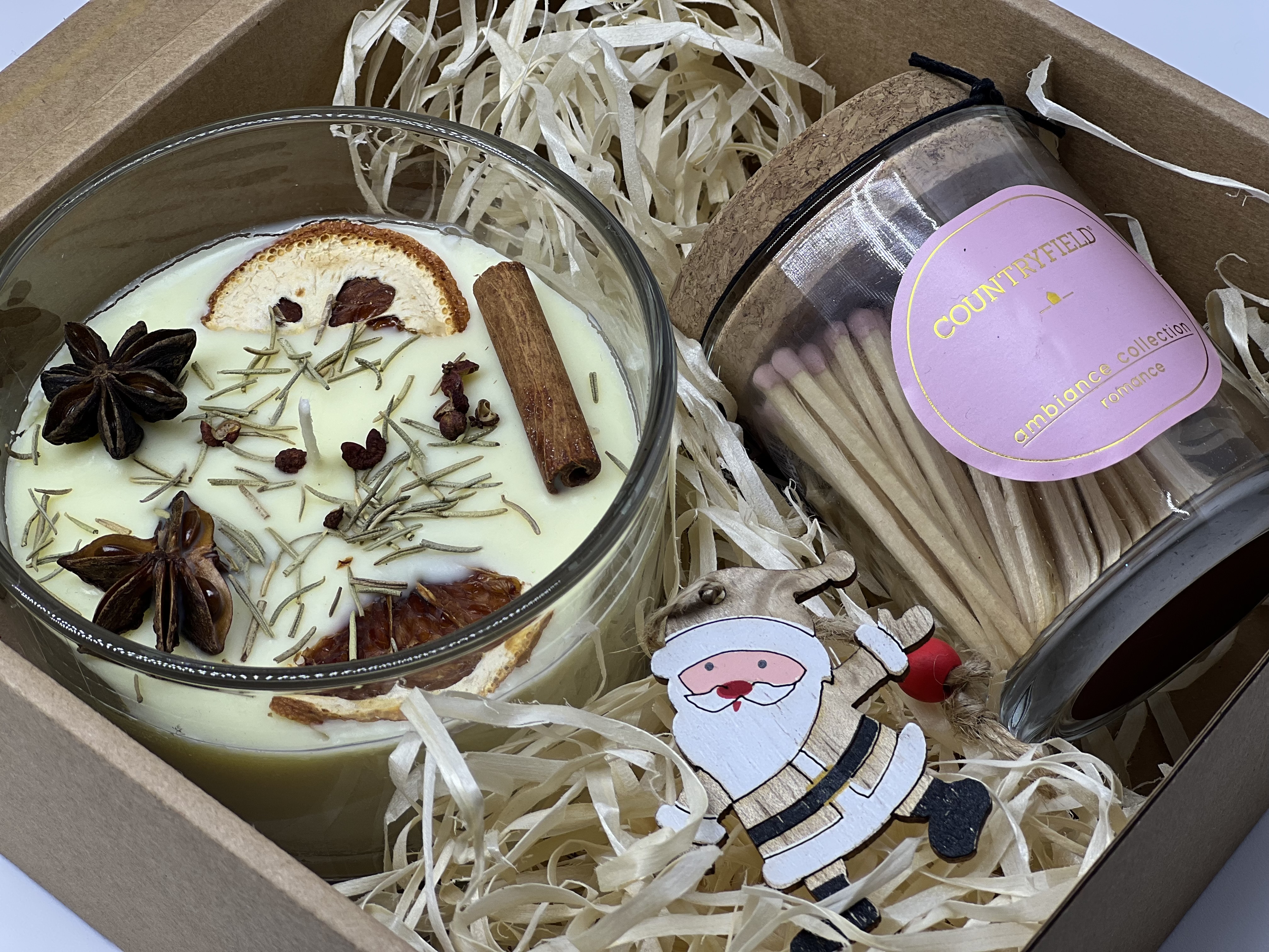 Kalėdinis rinkinys su Kalėdomis kvepiančia žvake