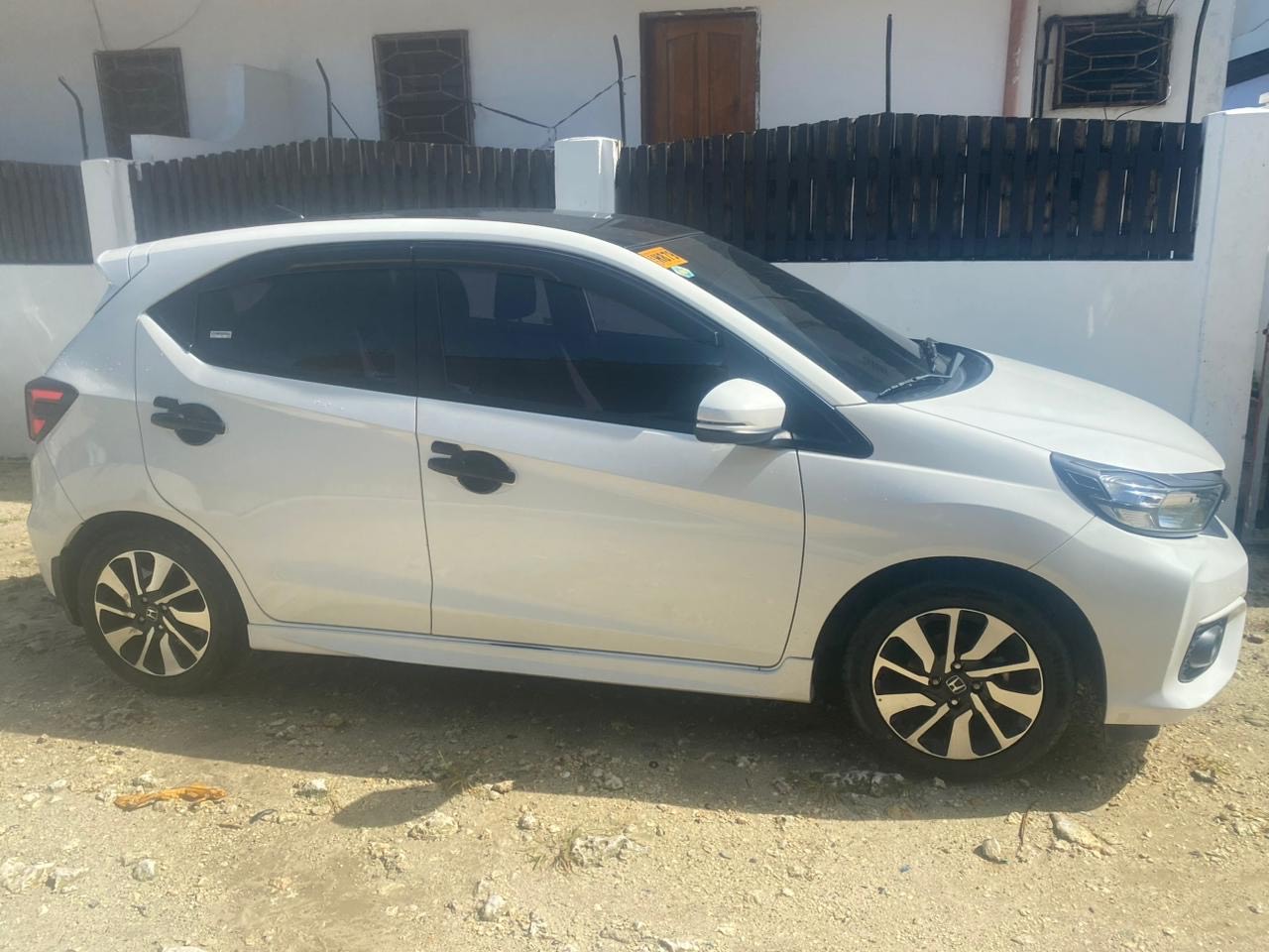 White Hatchback Honda Brio