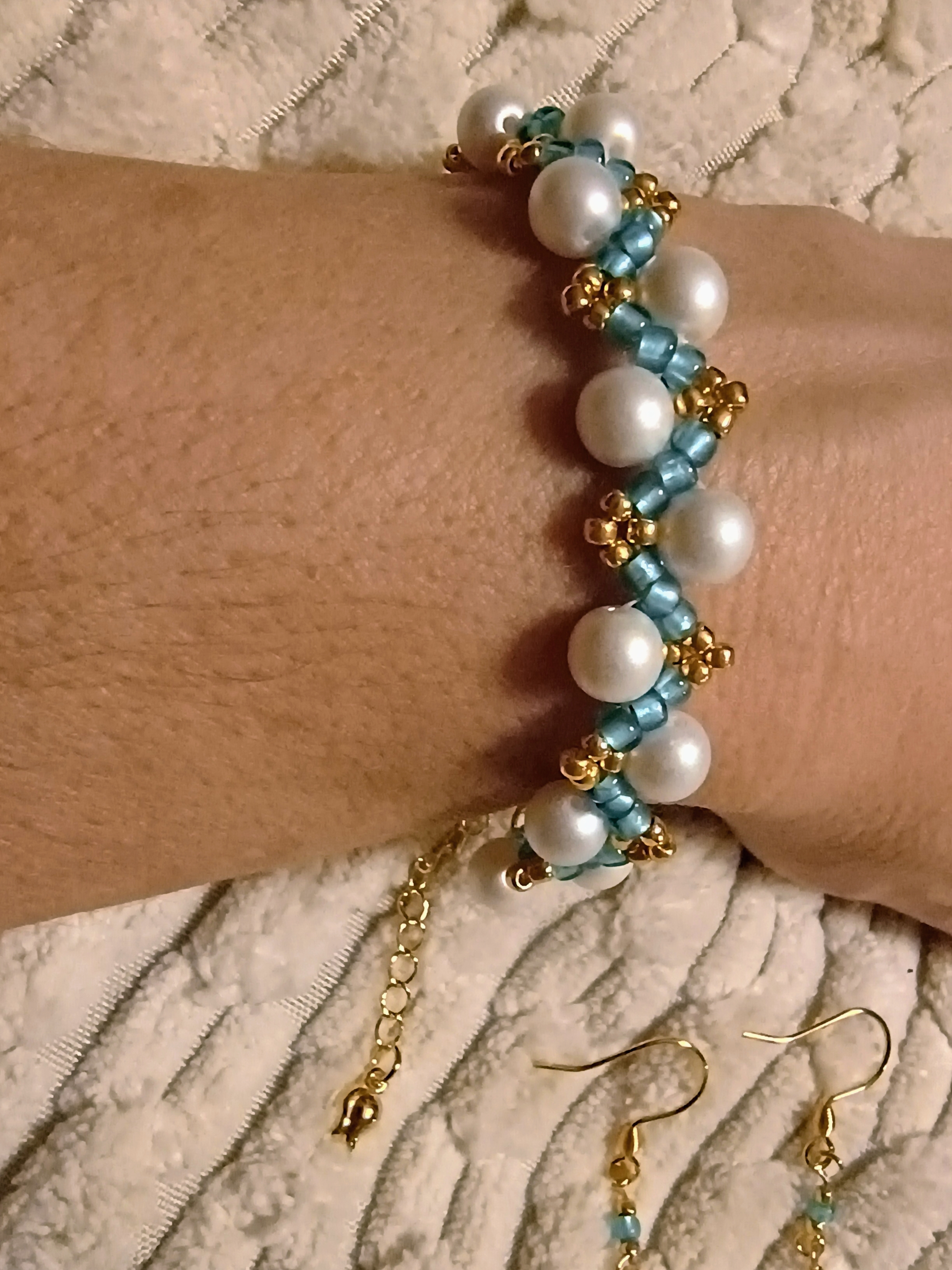 Elegant Glass Pearl & Bead Zigzag Bracelet in white, blue and gold with heart clasp
