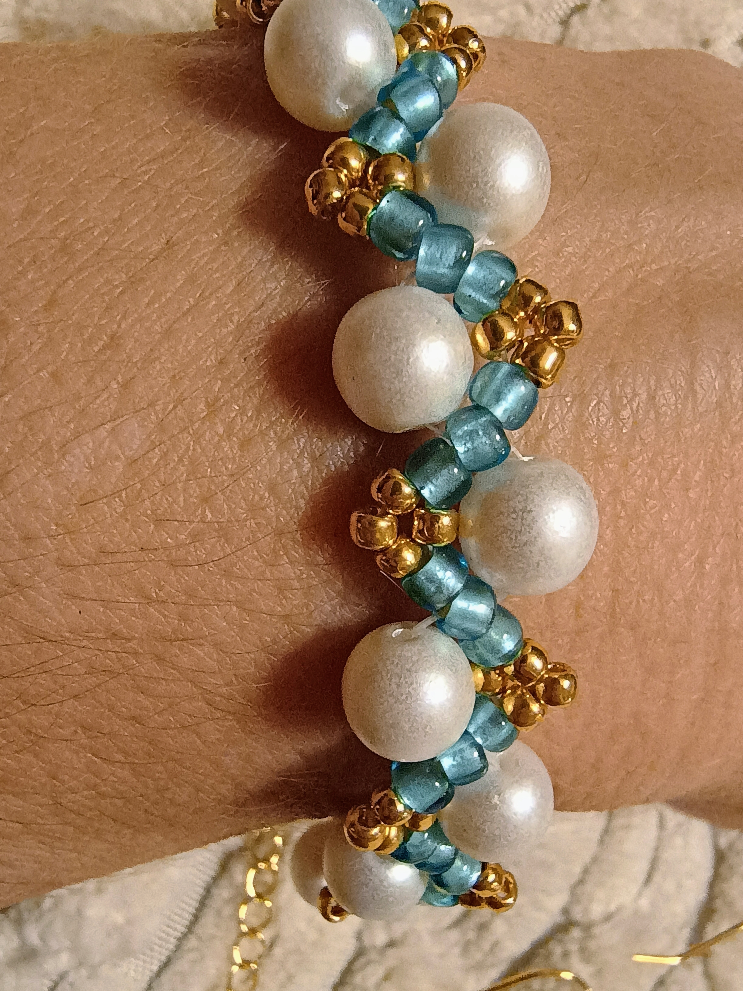 Elegant Glass Pearl & Bead Zigzag Bracelet in white, blue and gold with heart clasp