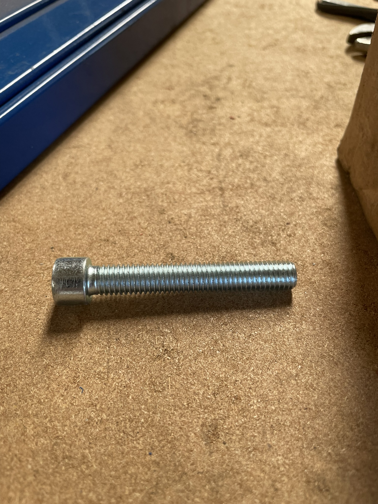 Bolt (M10 x 1.5 x 70, 35mm thread length, black)