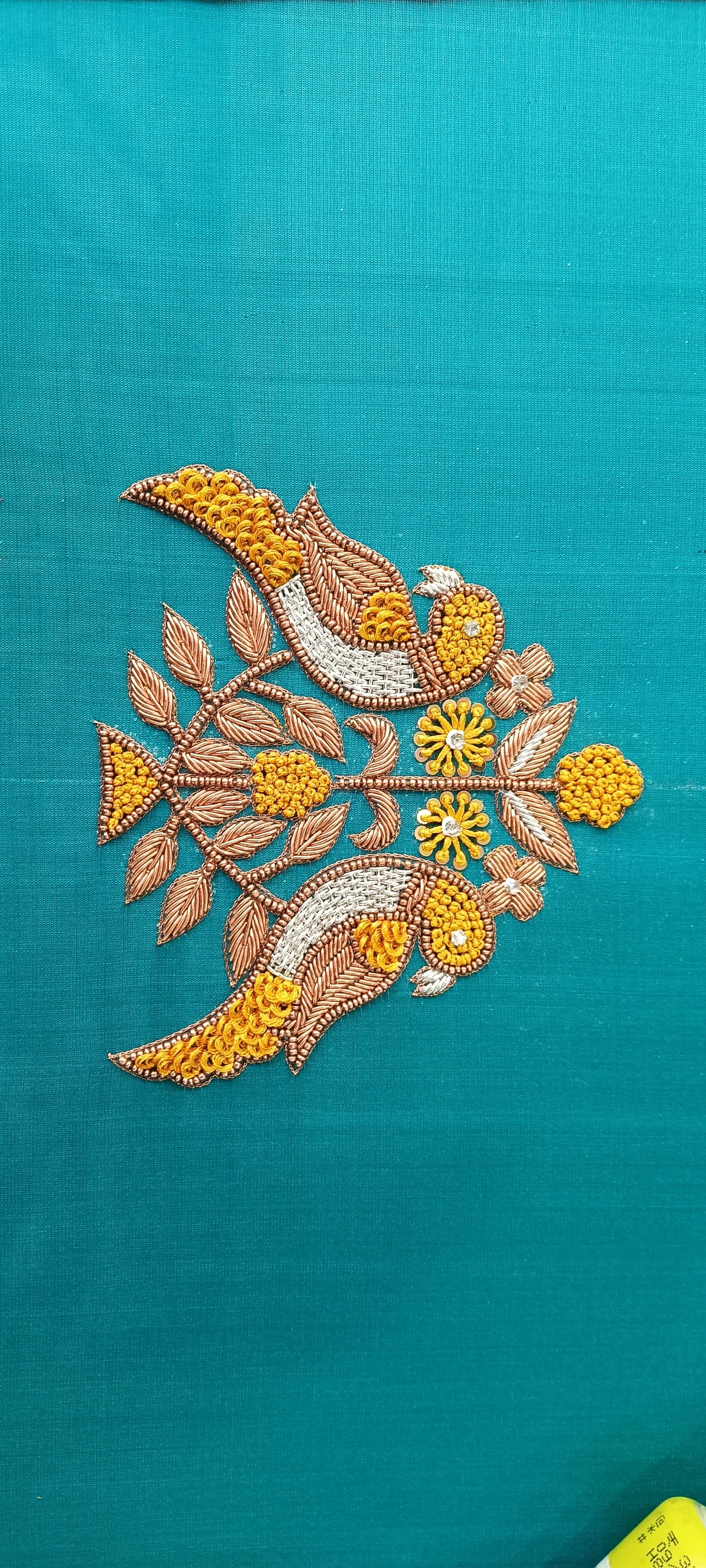 Turquoise Fabric with Embroidered Birds