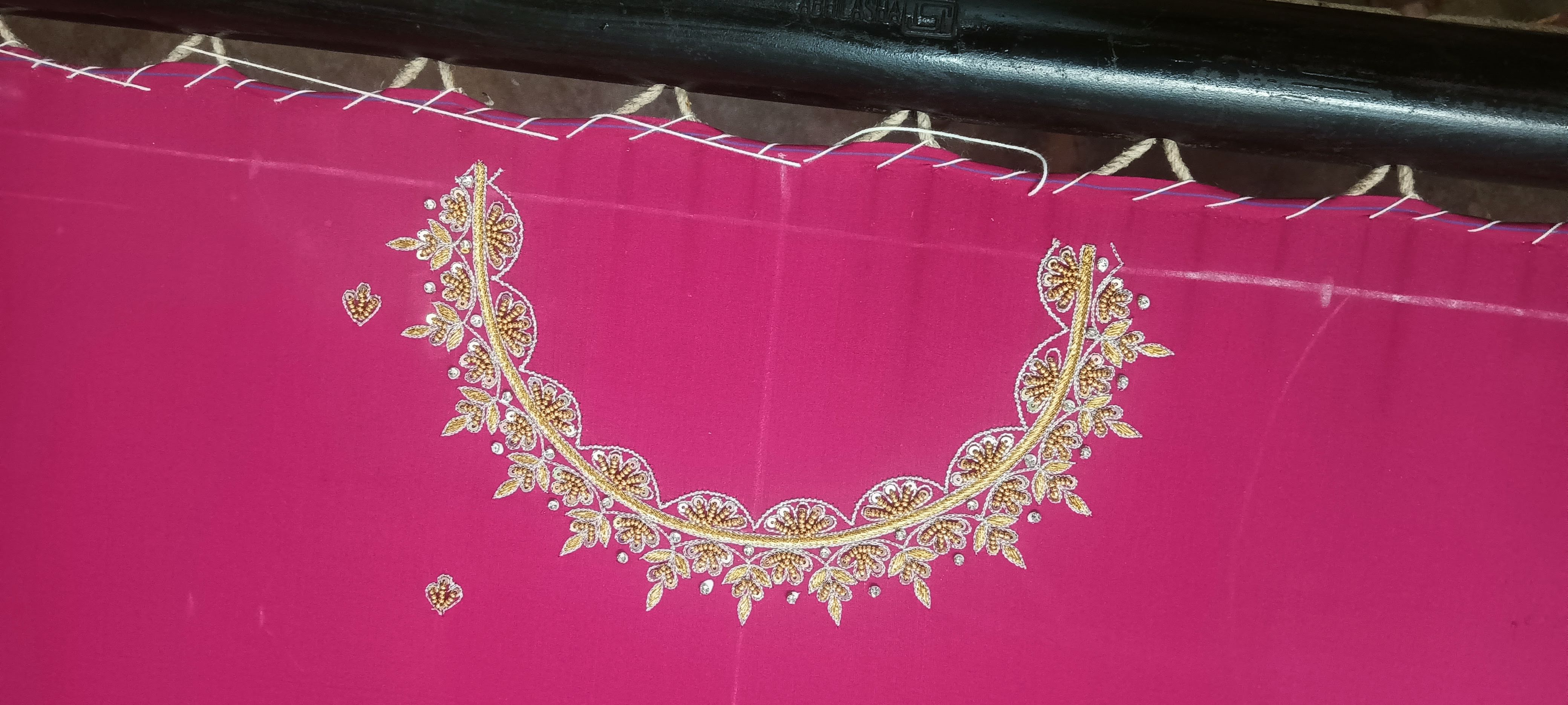 Pink embroidered fabric