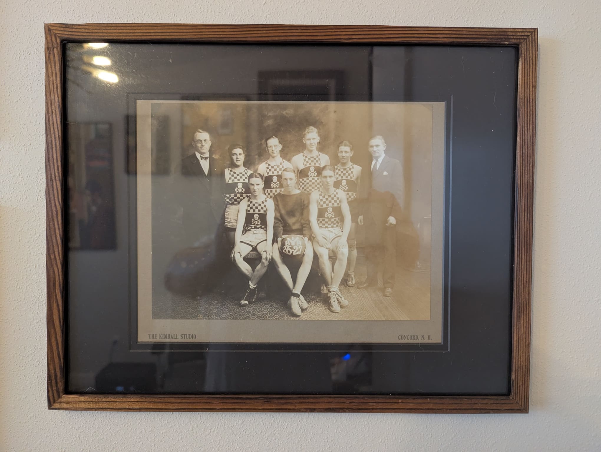 Framed & Matted 1926-27 Cabinet Card Photograph featuring unknown New Hampshire Team with BYB Skull & Bones Uniforms