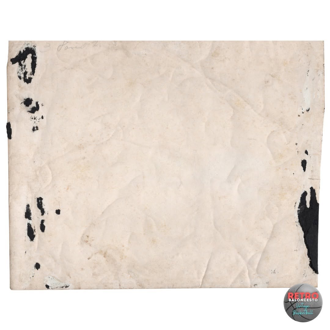 Photograph of Our Mother of Sorrow HS Basketball Team with Priest circa 1950s.