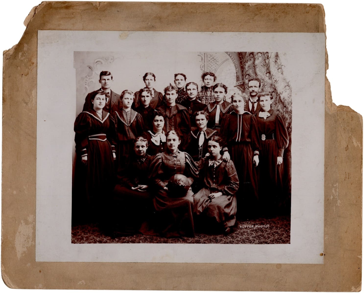 Early cabinet photo of an 1896 unknown women's basketball team