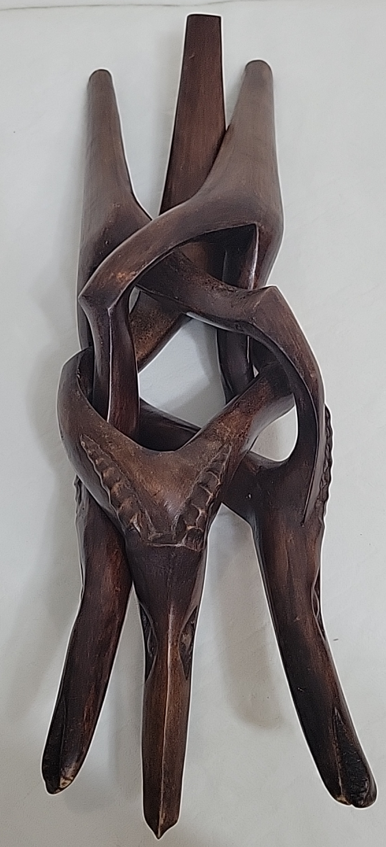 Pair Of African Wood Carved Interlocking Tripod Tables
