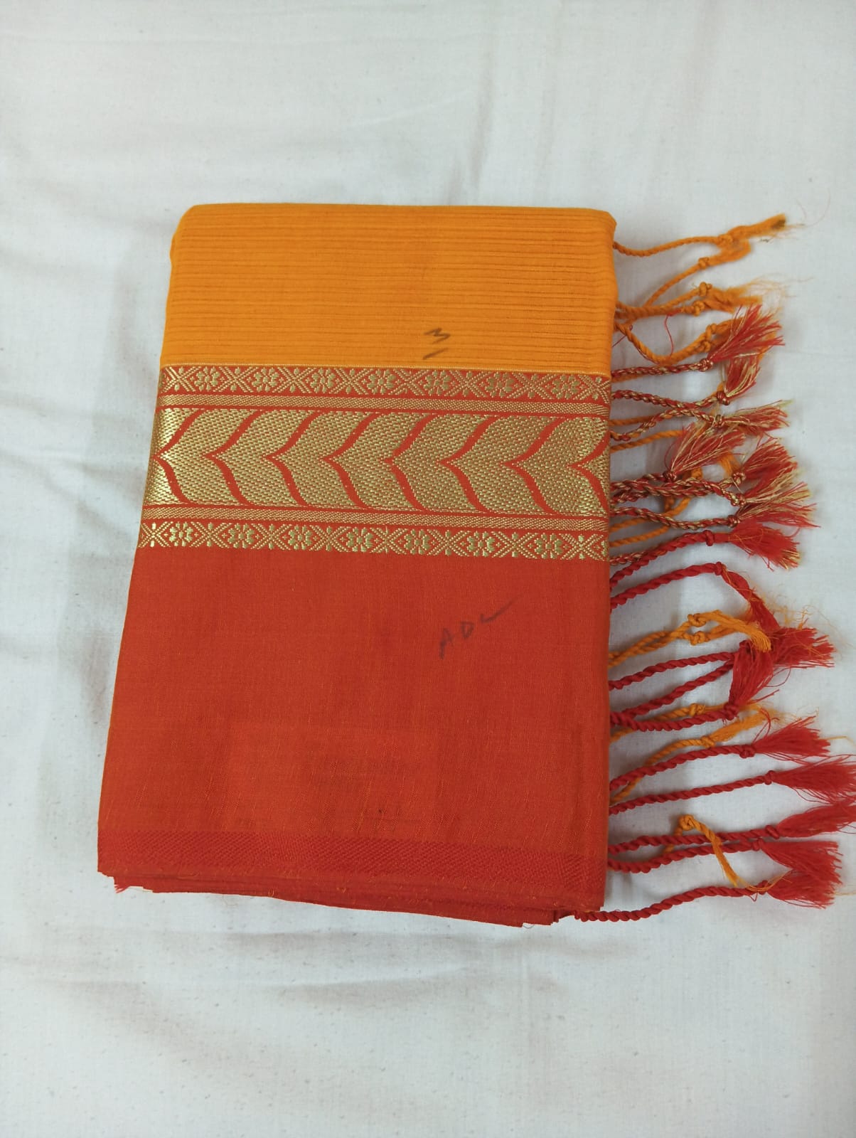 Mustard Plain Saree with Orange & Golden Border